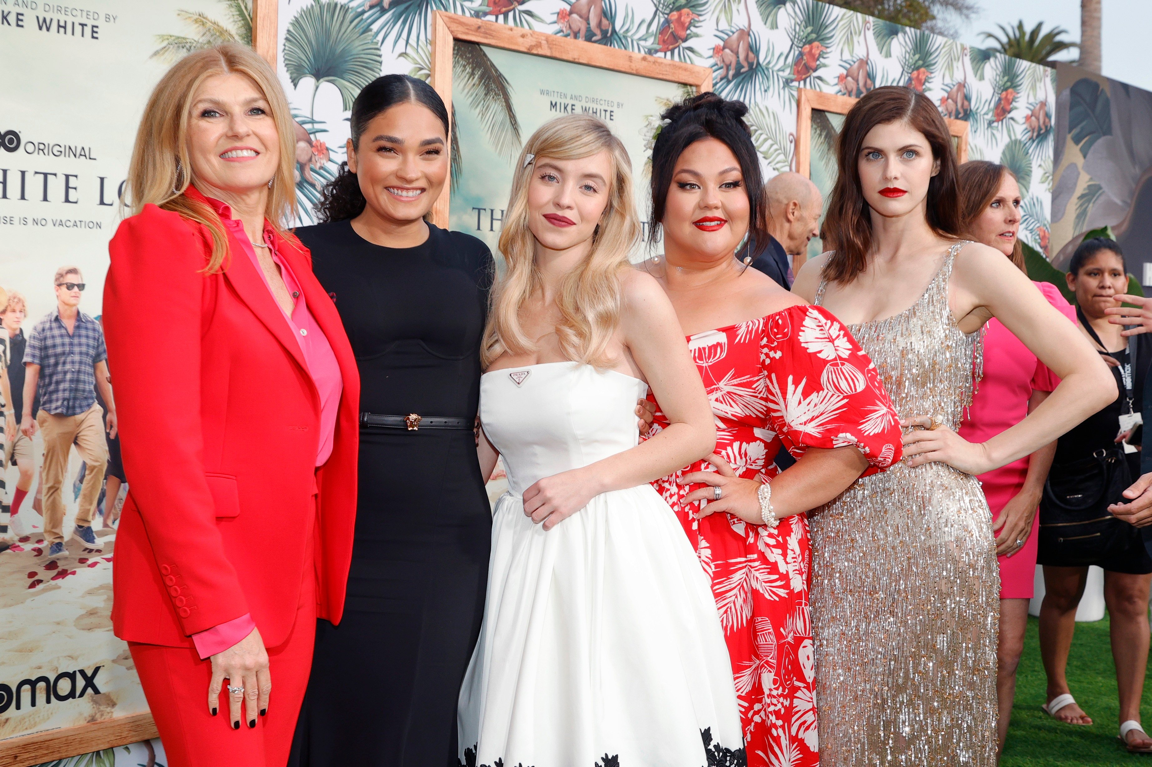 Some of The White Lotus Episode 1 cast posing for photographers at the Los Angeles Premiere: Connie Britton, Brittany O'Grady, Sydney Sweeney, Jolene Purdy, and Alexandra Daddario