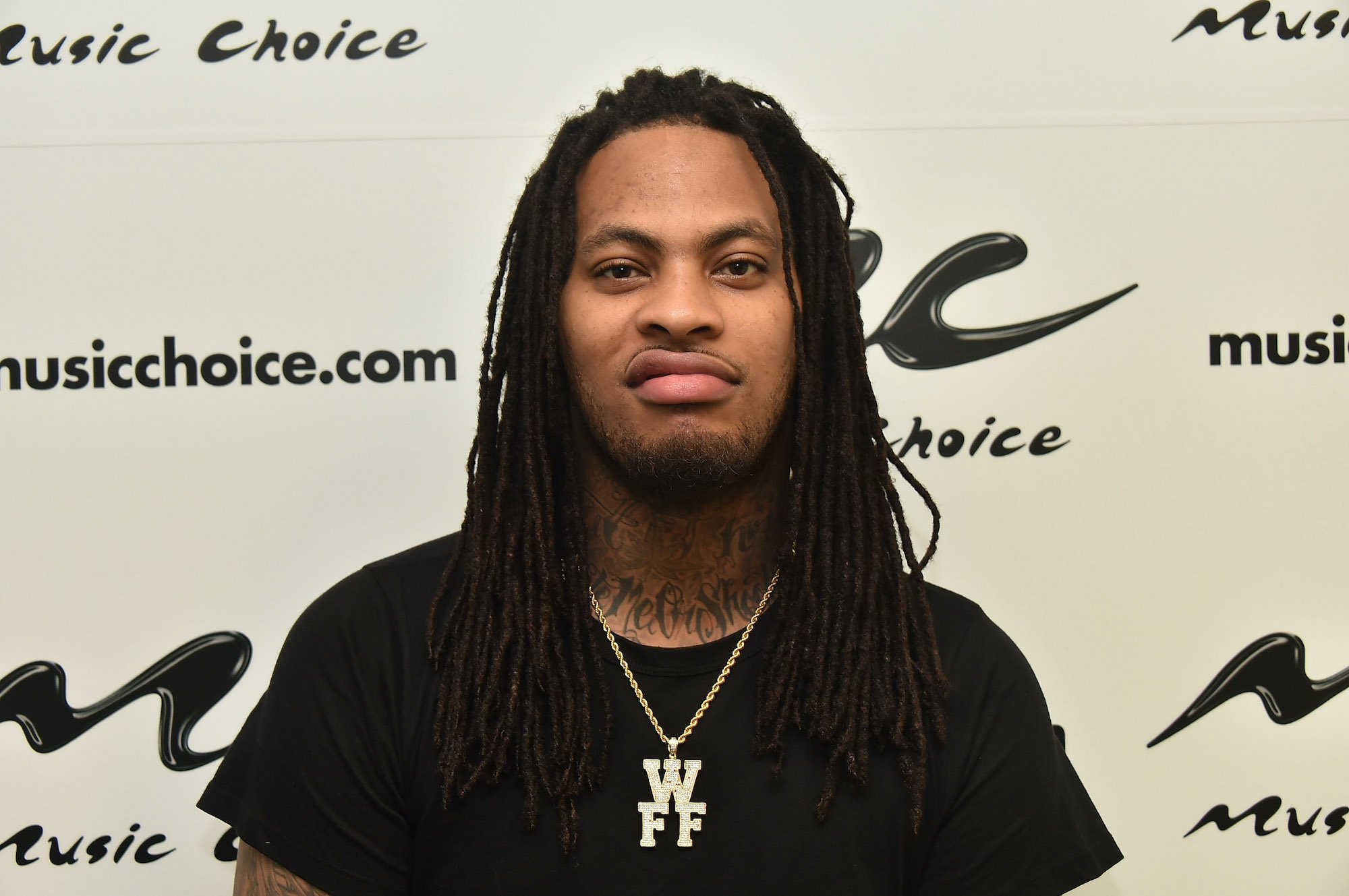 Waka Flocka Flame in front of a white background