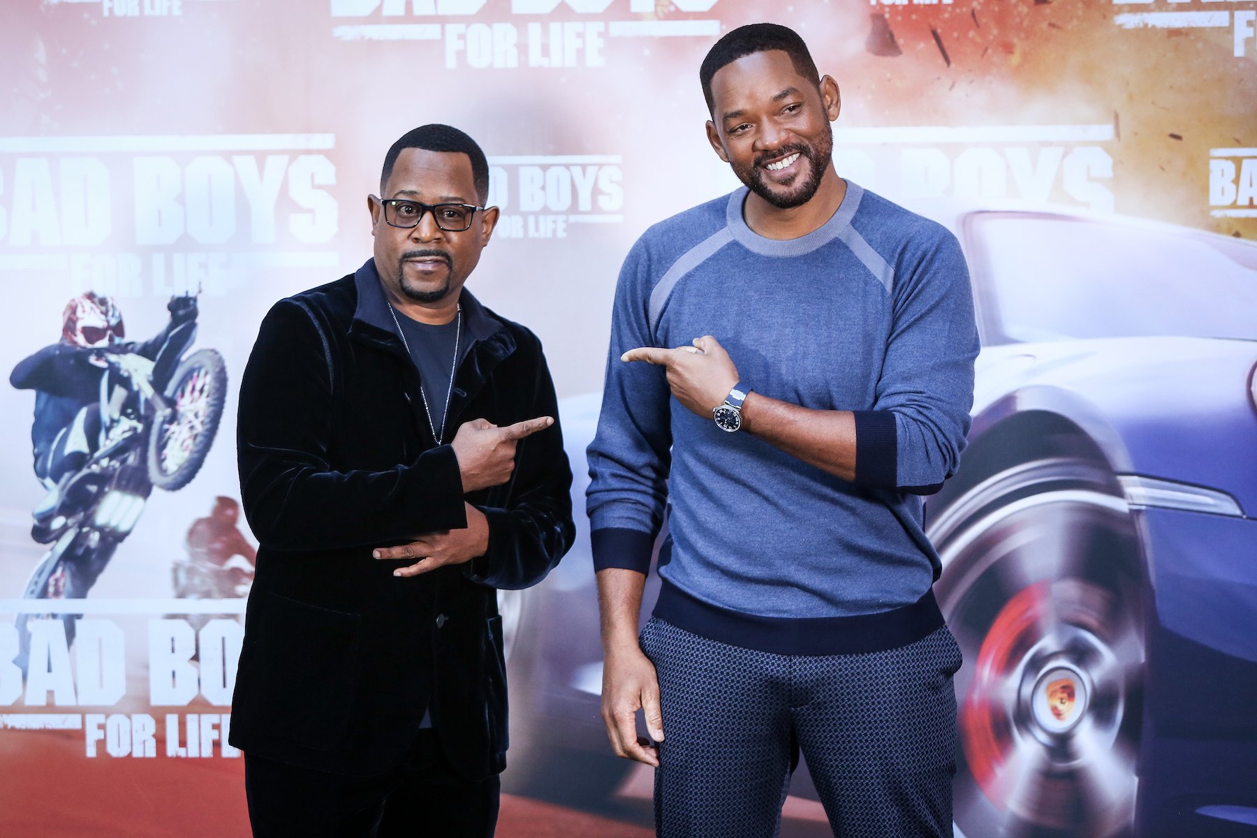 Martin Lawrence and Will Smith smiling and standing side by side as they attend the 'Bad Boys For Life' photo call in 2020
