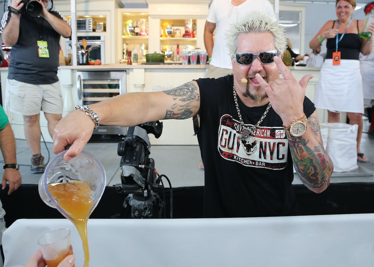 Guy Fieri poses for the camera in 2013