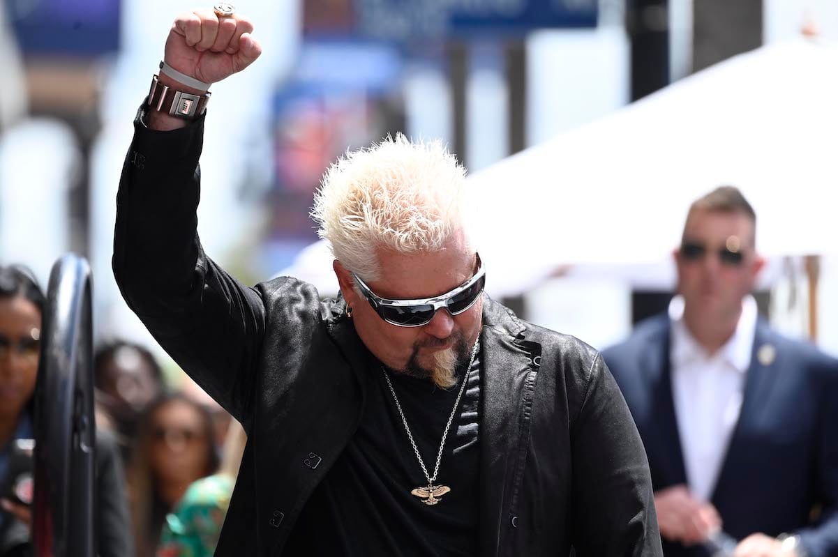 Guy Fieri cheers during Hollywood Walk of Fame induction