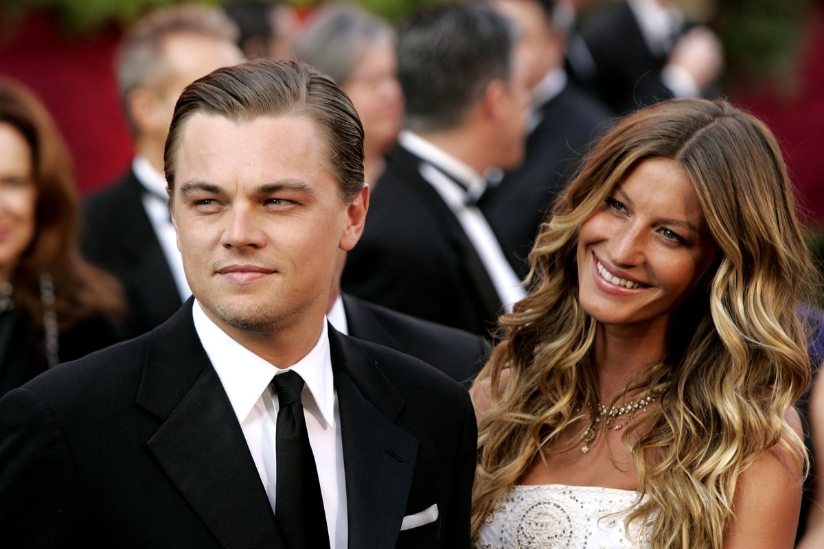 Leonardo DiCaprio and Gisele Bundchen (R) at the Academy Awards in 2005. 