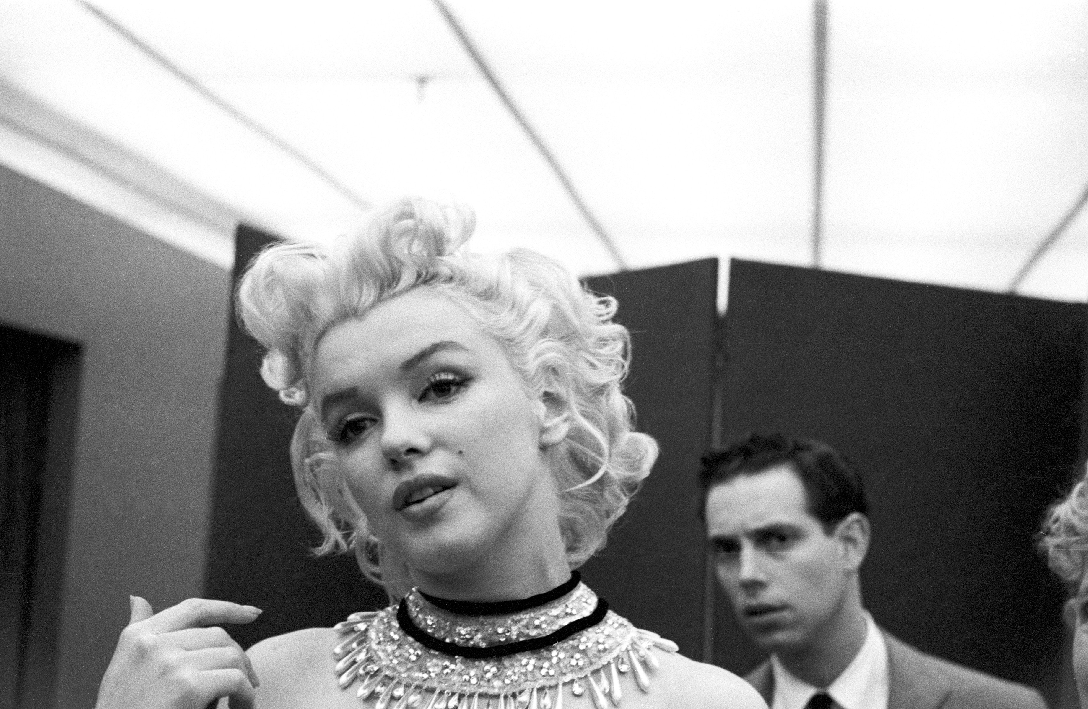 Marilyn Monroe during a costume fitting