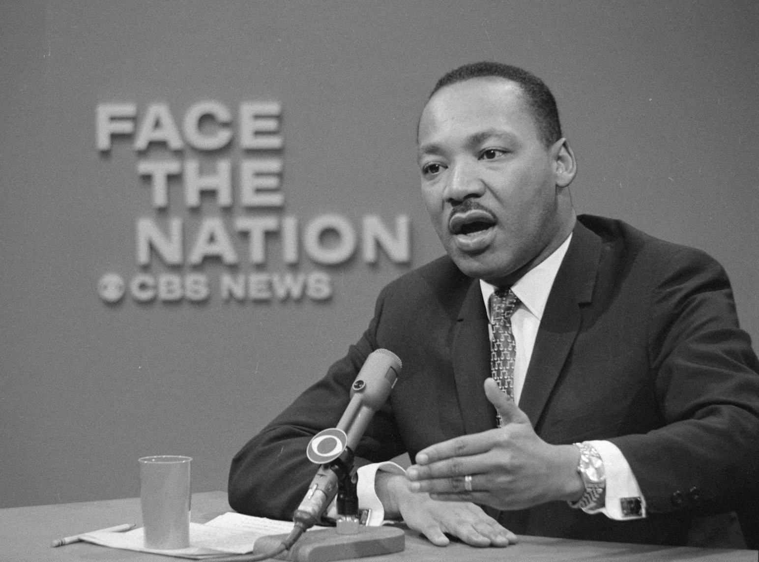 Dr. Martin Luther King at a desk