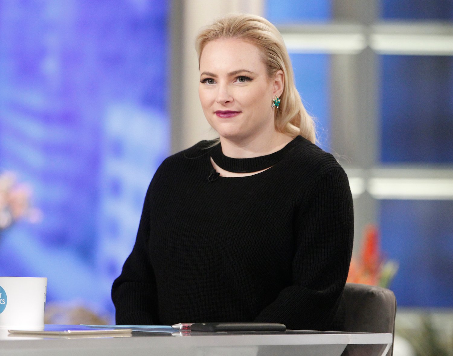 Meghan McCain smiling on the set of 'The View' in 2018