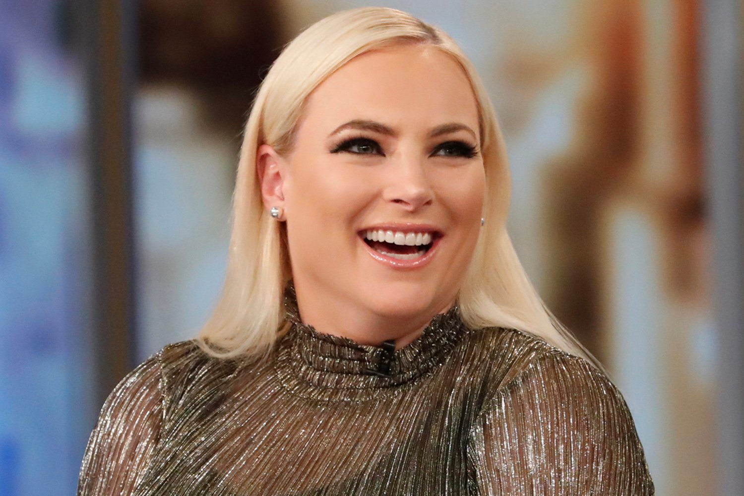 Meghan McCain smiling while hosting 'The View' in 2019