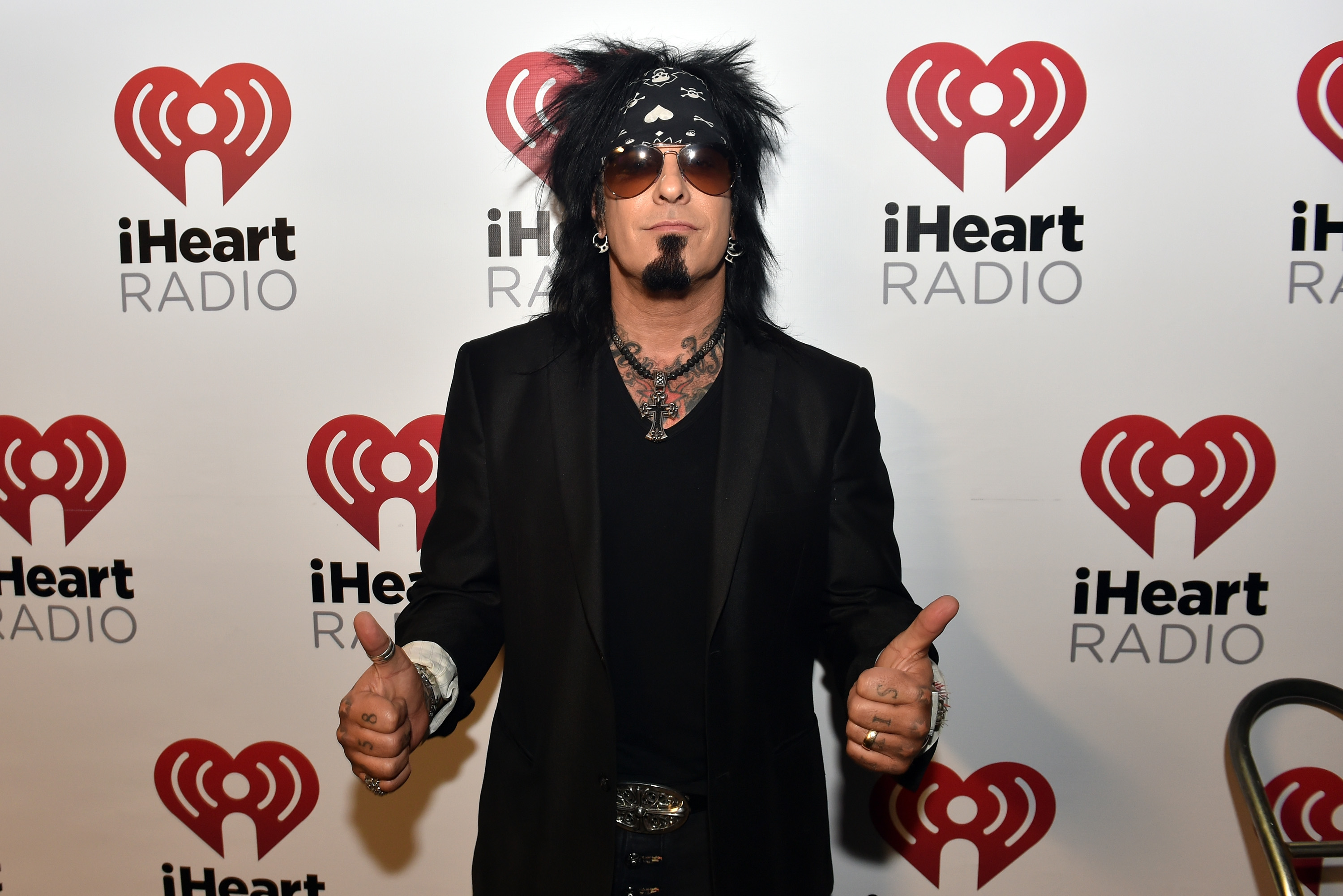 Mötley Crüe's Nikki Sixx wearing a bandana