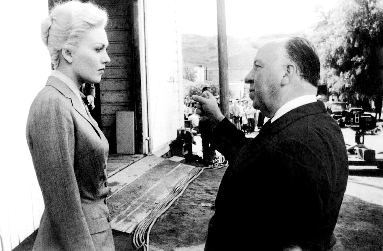 Kim Novak speaks with Alfred Hitchcock on location while filming 'Vertigo.'