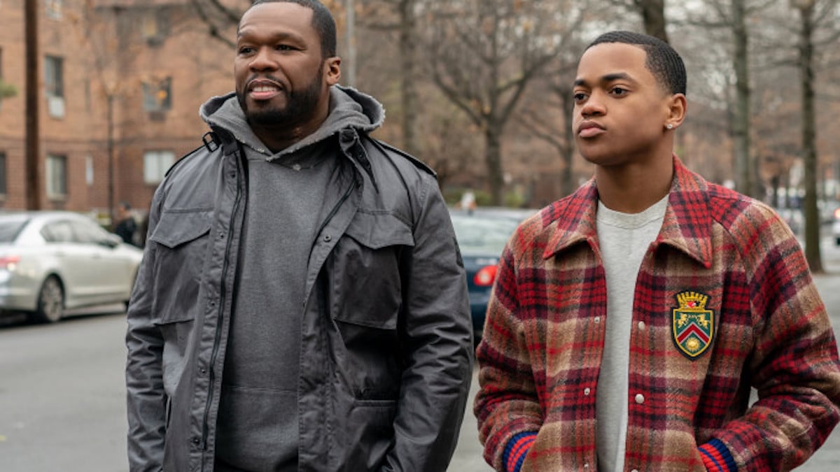 Curtis "50 Cent" Jackson as Kanan Stark and Michael Rainey Jr. as Taria St. Patrick both stand outside, smirking into the camera in 'Power'