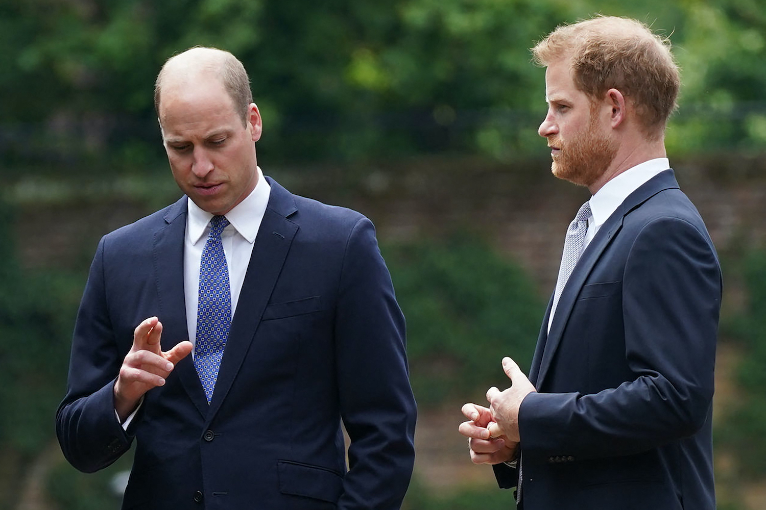 Prince William and Prince Harry at the unveiling of a statue of their mother, Princess Diana at The Sunken Garden in Kensington Palace