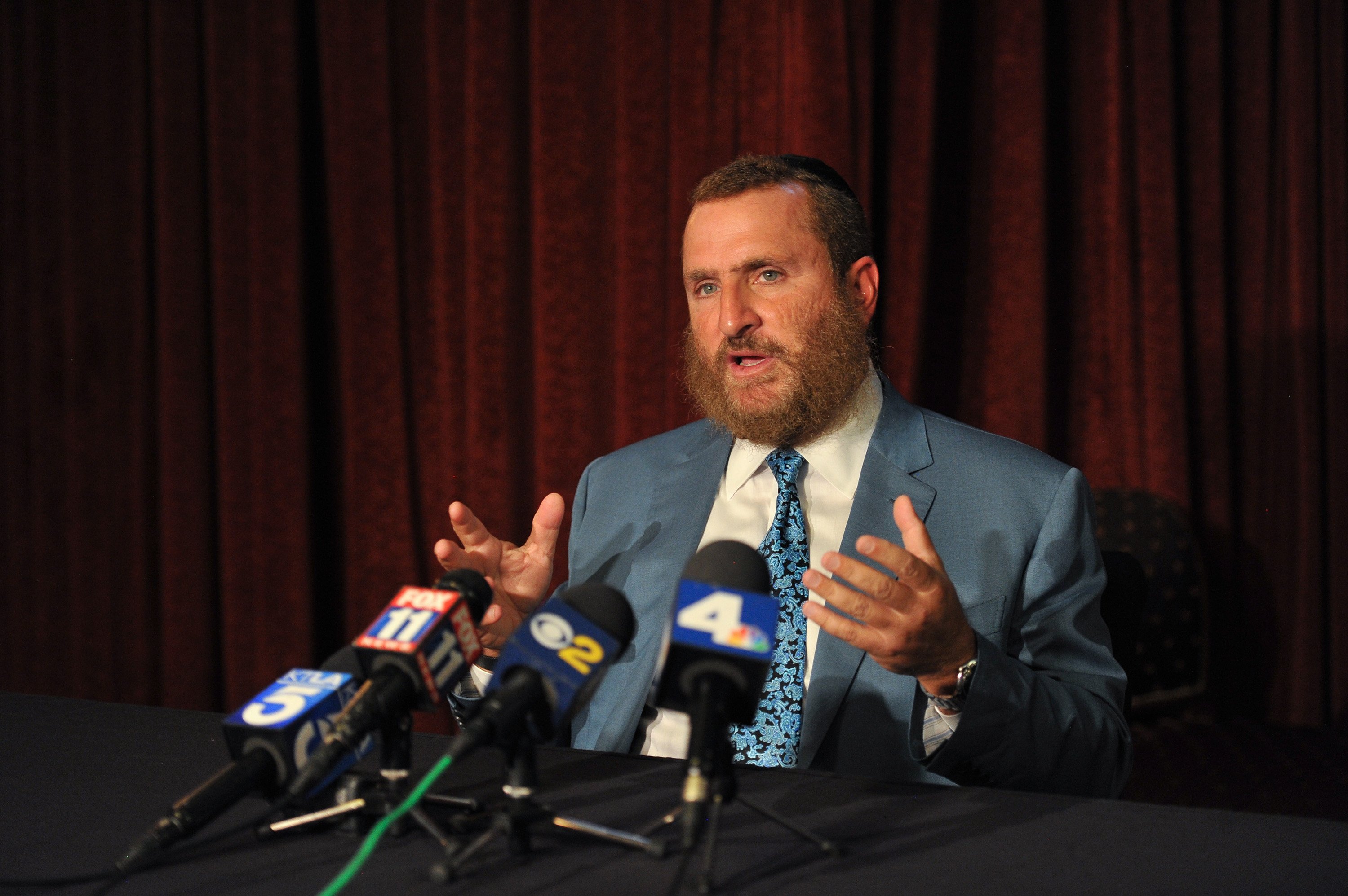 Rabbi Shmuley Boteach with microphones