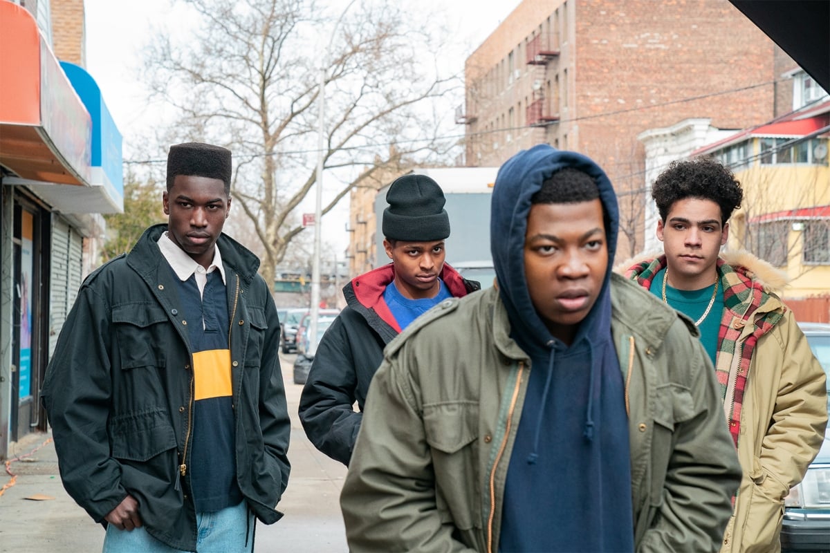 'Power Book III: Raising Kanan' with Mekai Curtis as Kanan, Nile Bullock as D-Wiz, Antonio Ortiz as Shawn ‘Famous' Figueroa, and Donte Grey as Buck Twenty standing on the street in jackets