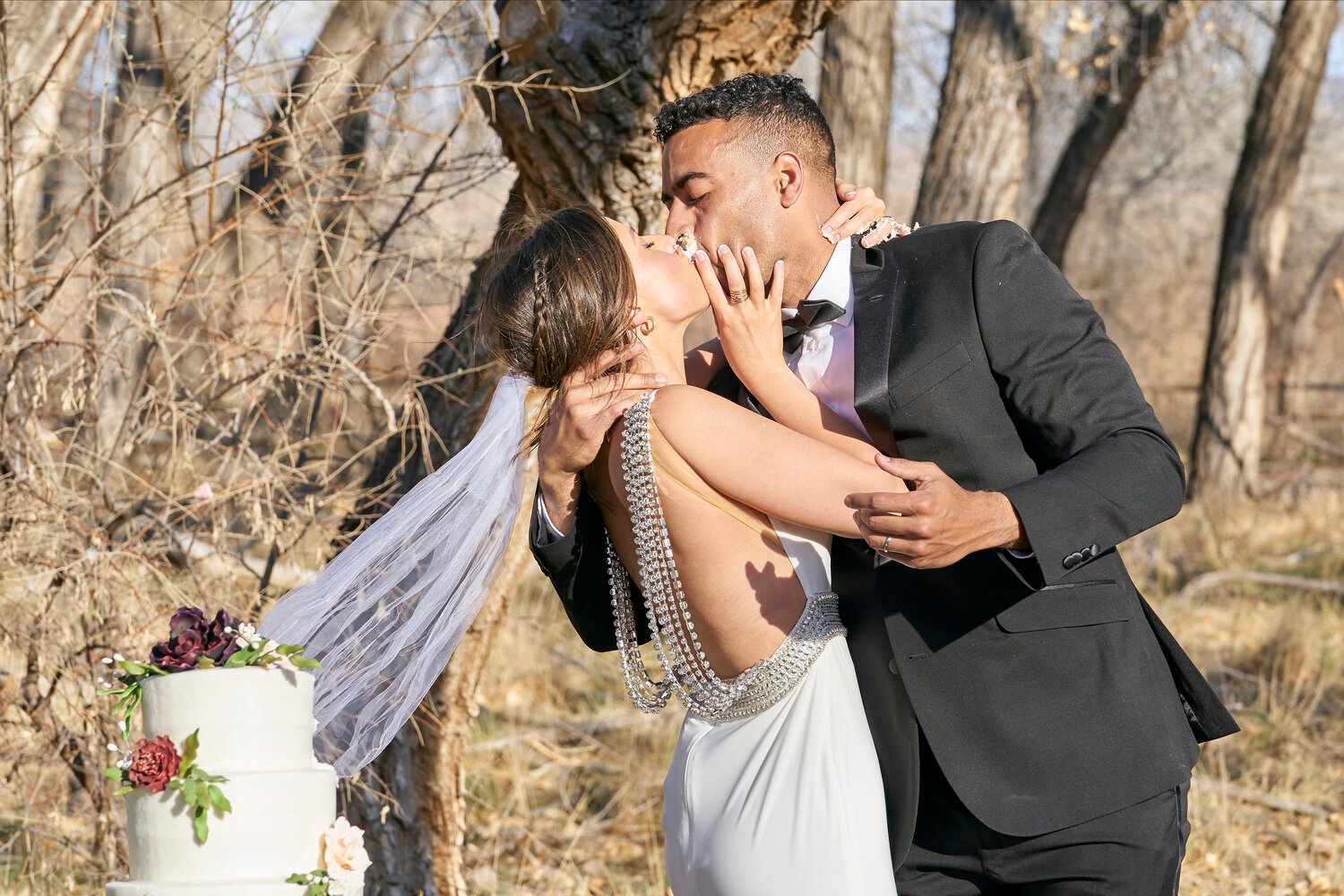 Katie Thurston and Justin Glaze kiss in their wedding attire for their one-on-one on 'The Bachelorette'