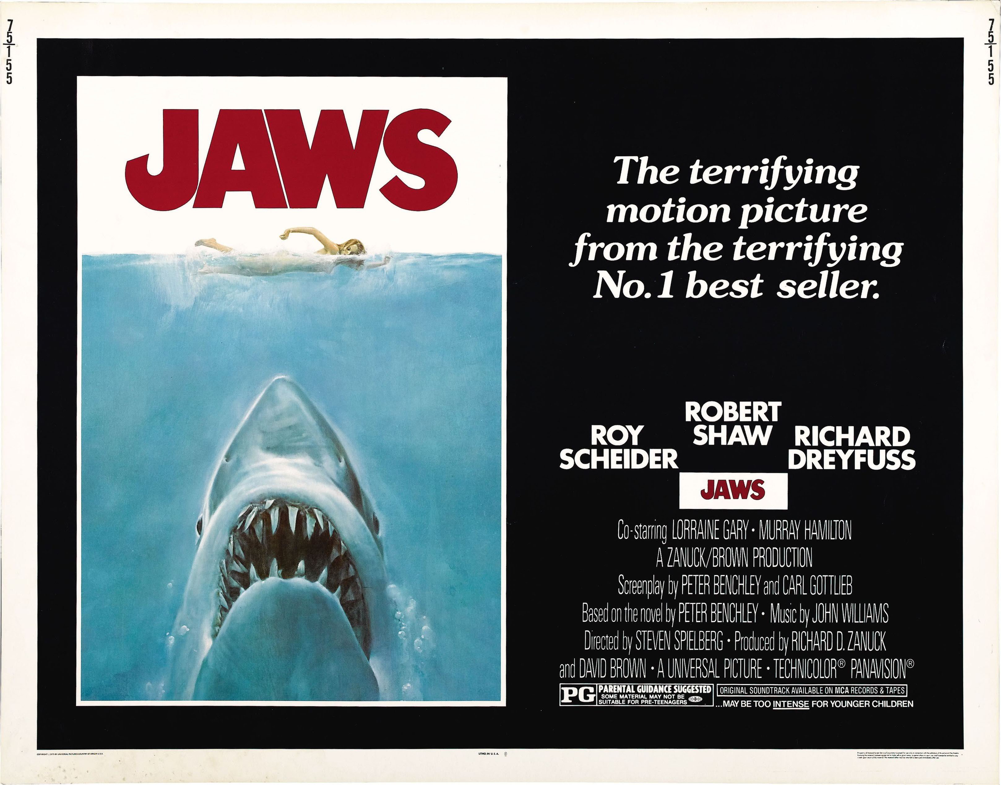 A poster for Steven Spielberg's 'Jaws' depicting a woman and a shark