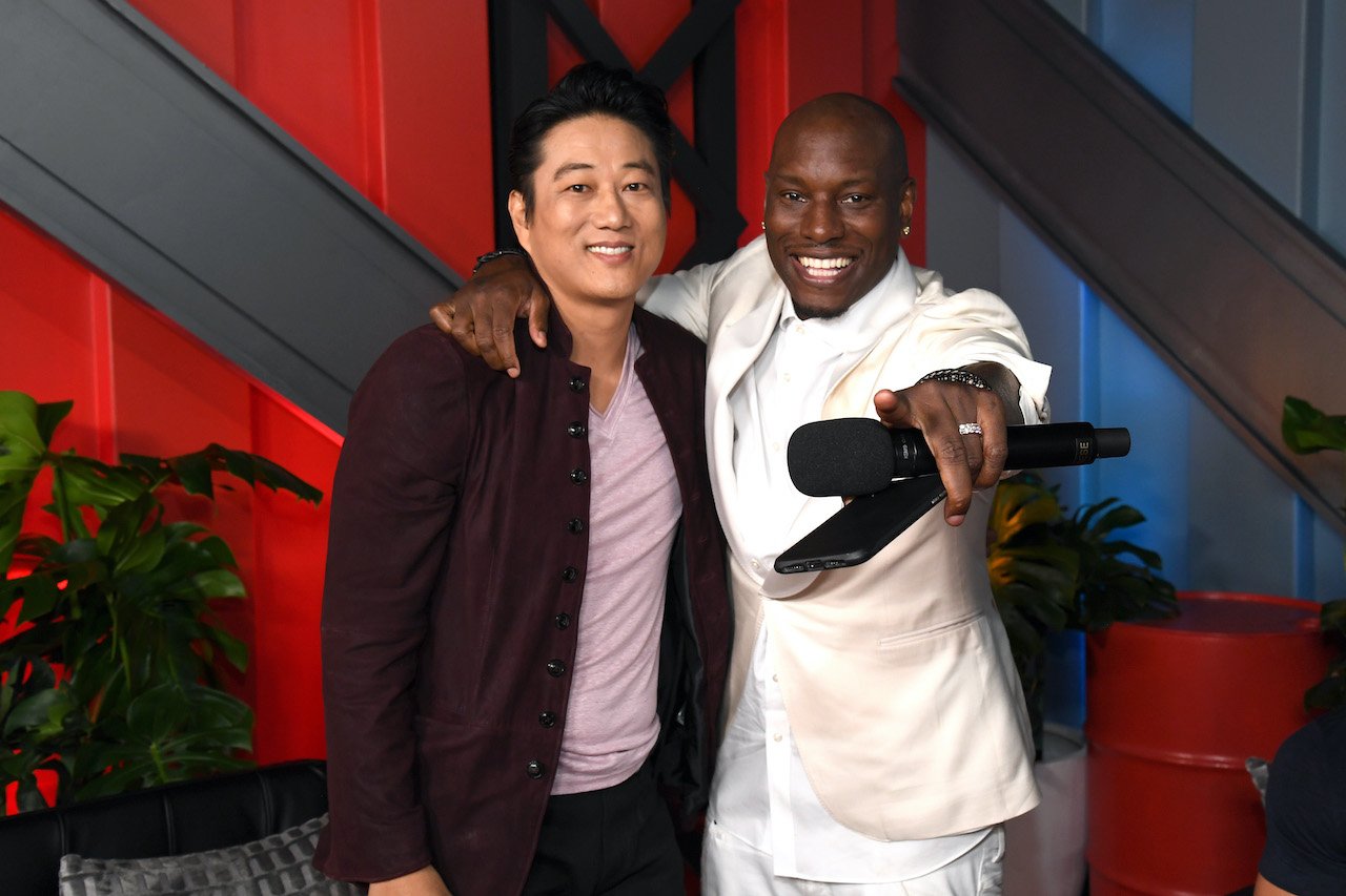 Sung Kang and Tyrese Gibson attend Universal Pictures Presents The Road To F9 Concert and Trailer Drop
