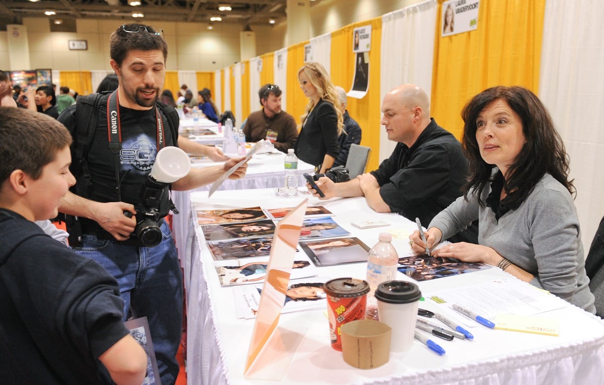 Torri Higginson signs authographs for fans at ComiCon Toronto 2013.