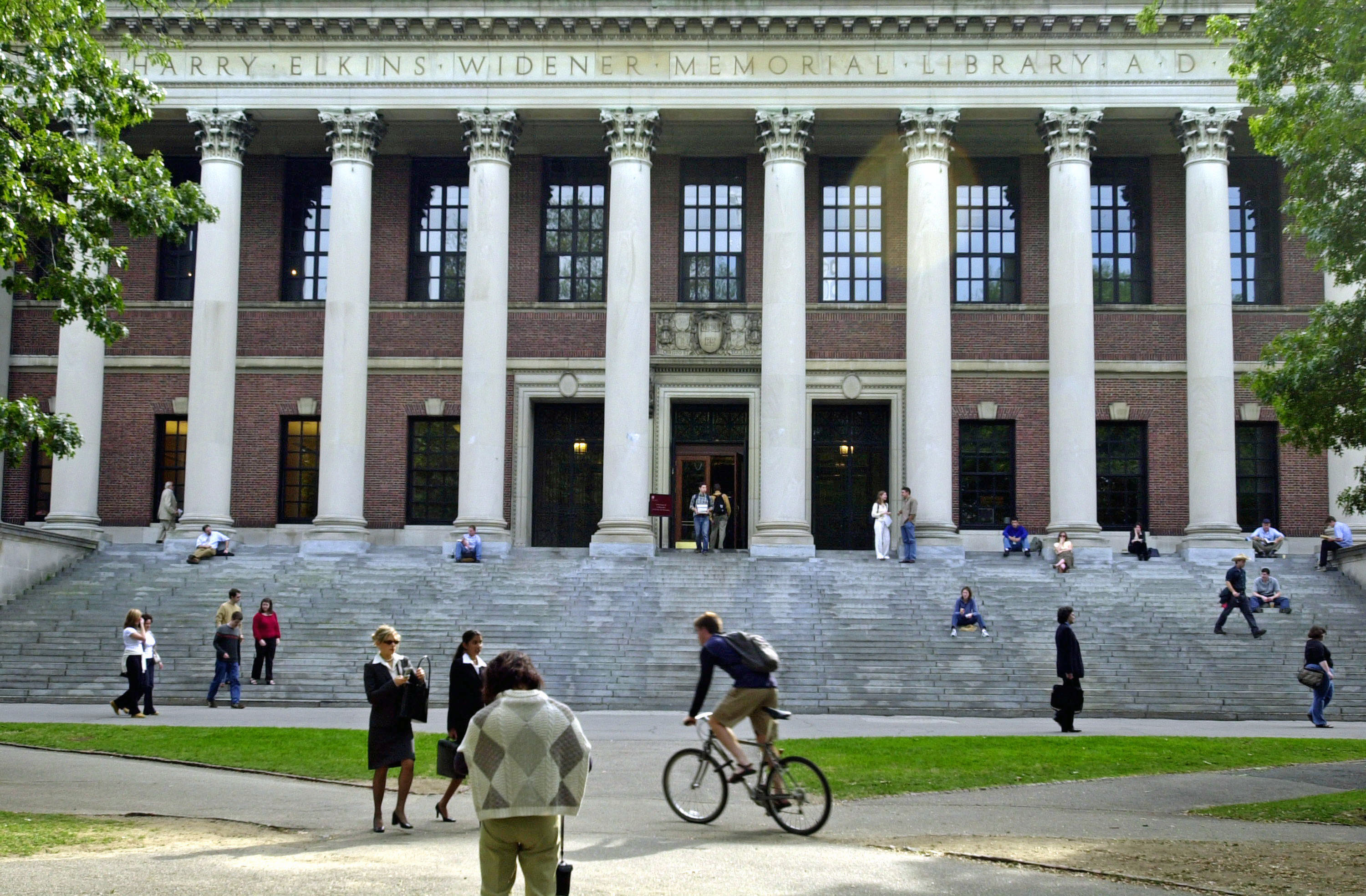 Students walking around Harvard's Larry Elkins Widener Memorial Library, a setting for Margaret Atwood's book 'The Handmaid's Tale'