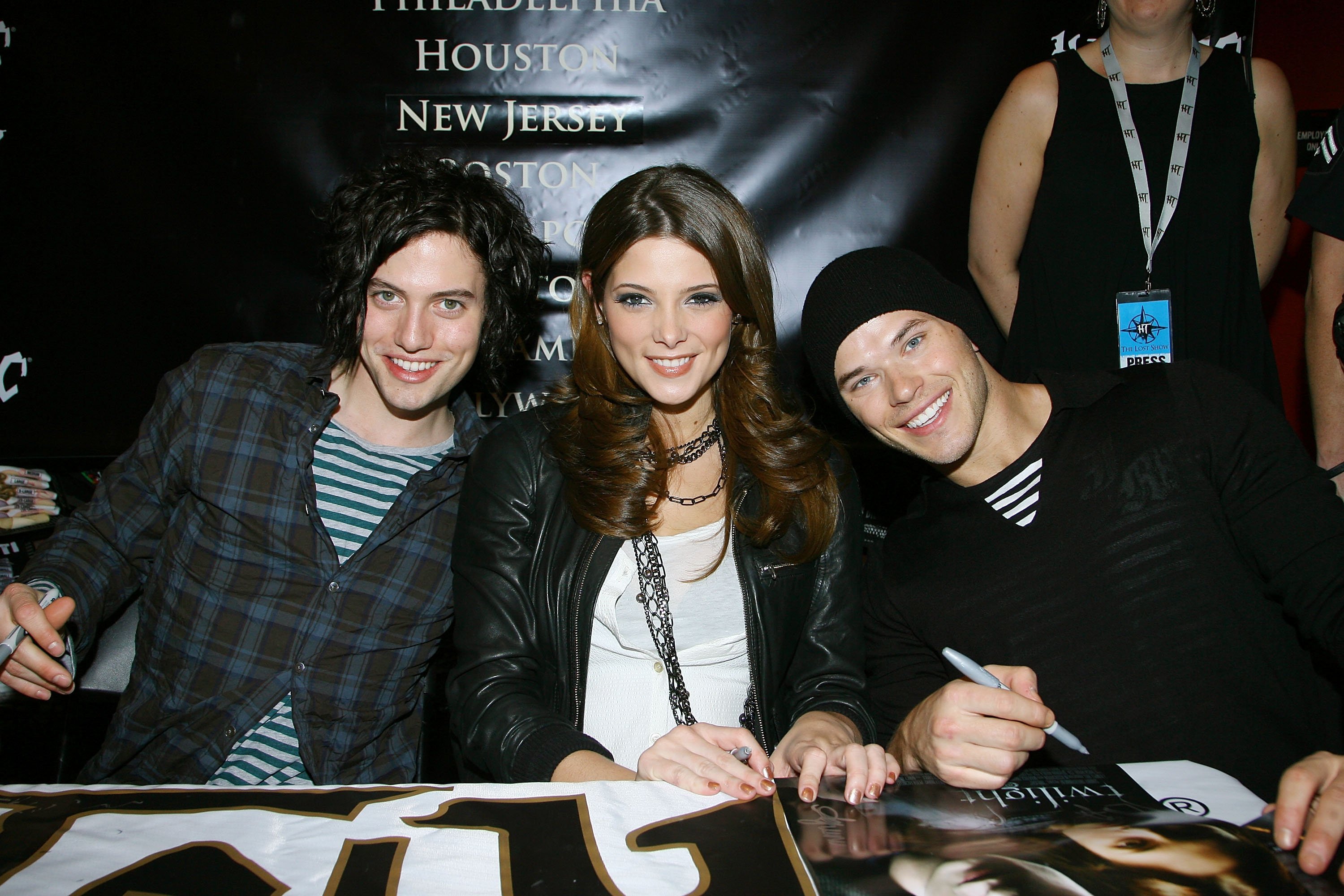 Jackson Rathbone, Ashley Greene and Kellan Lutz signing autographs