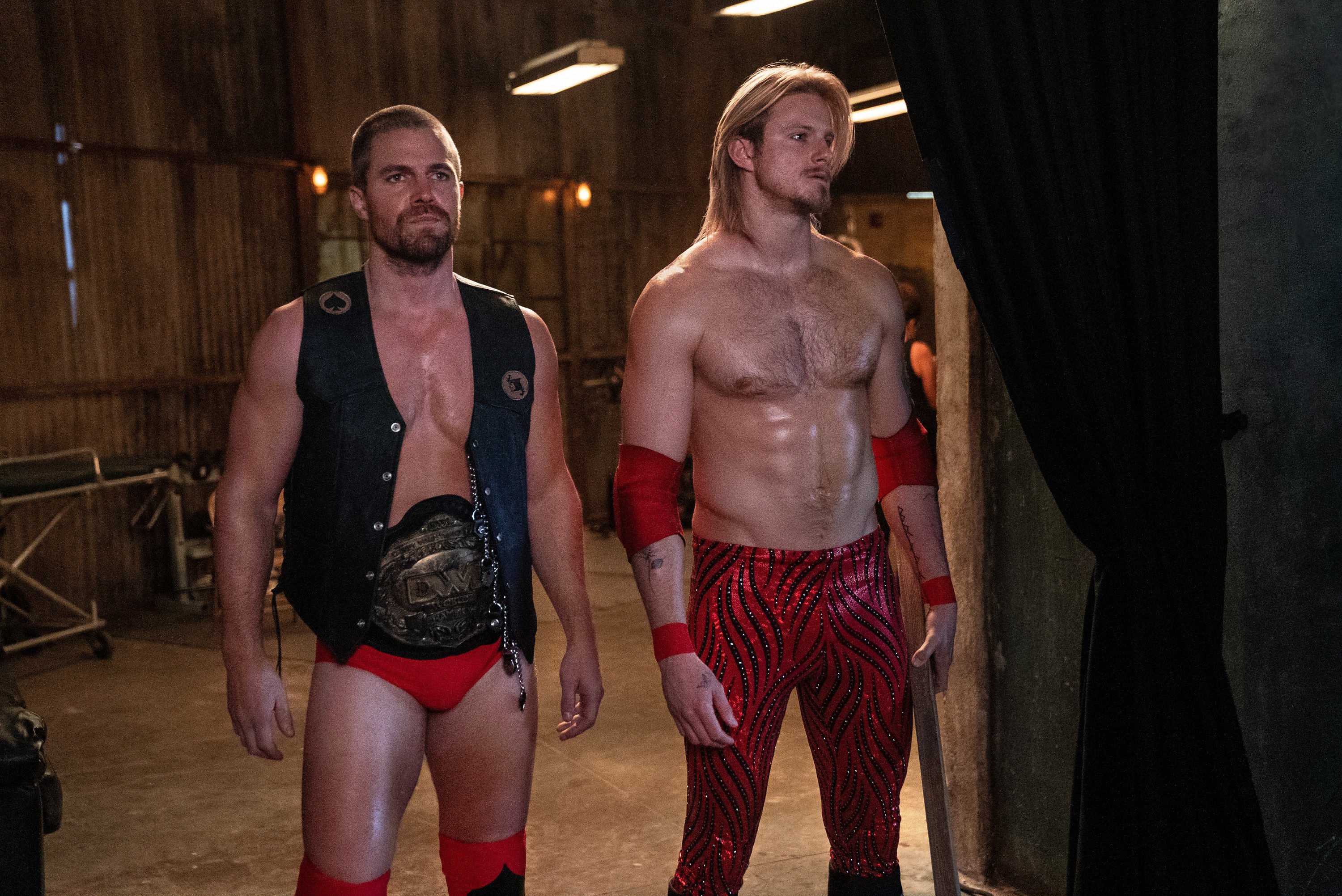 Alexander Ludwig and Stephen Amell prepare to enter the ring