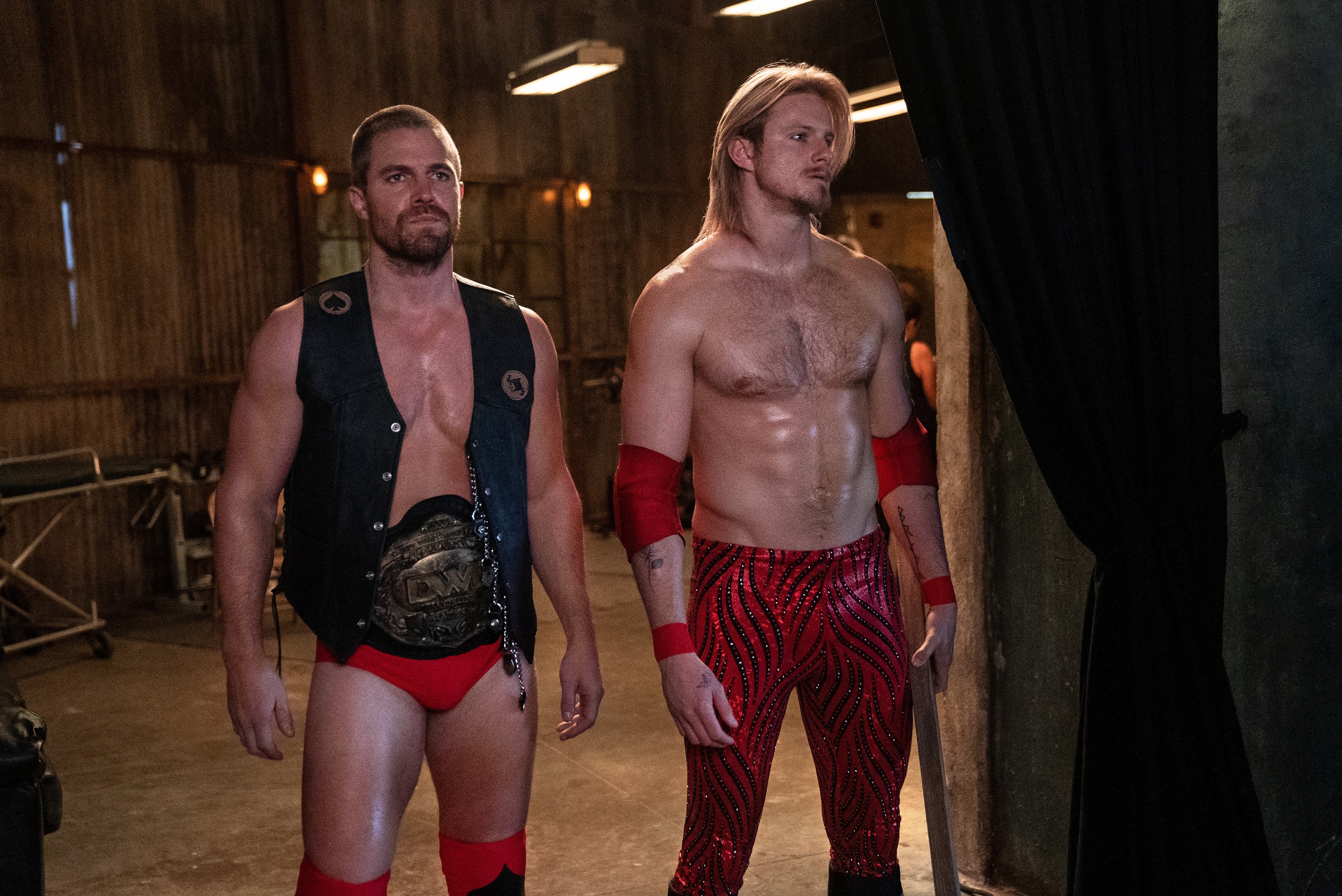 Alexander Ludwig and Stephen Amell prepare to enter the ring