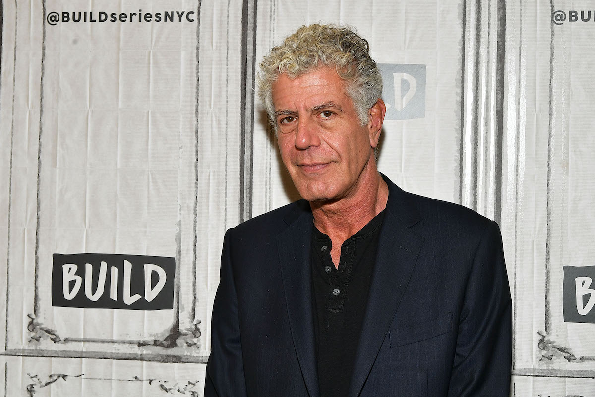 Anthony Bourdain wears a black suit on the red carpet for 'Build Presents'