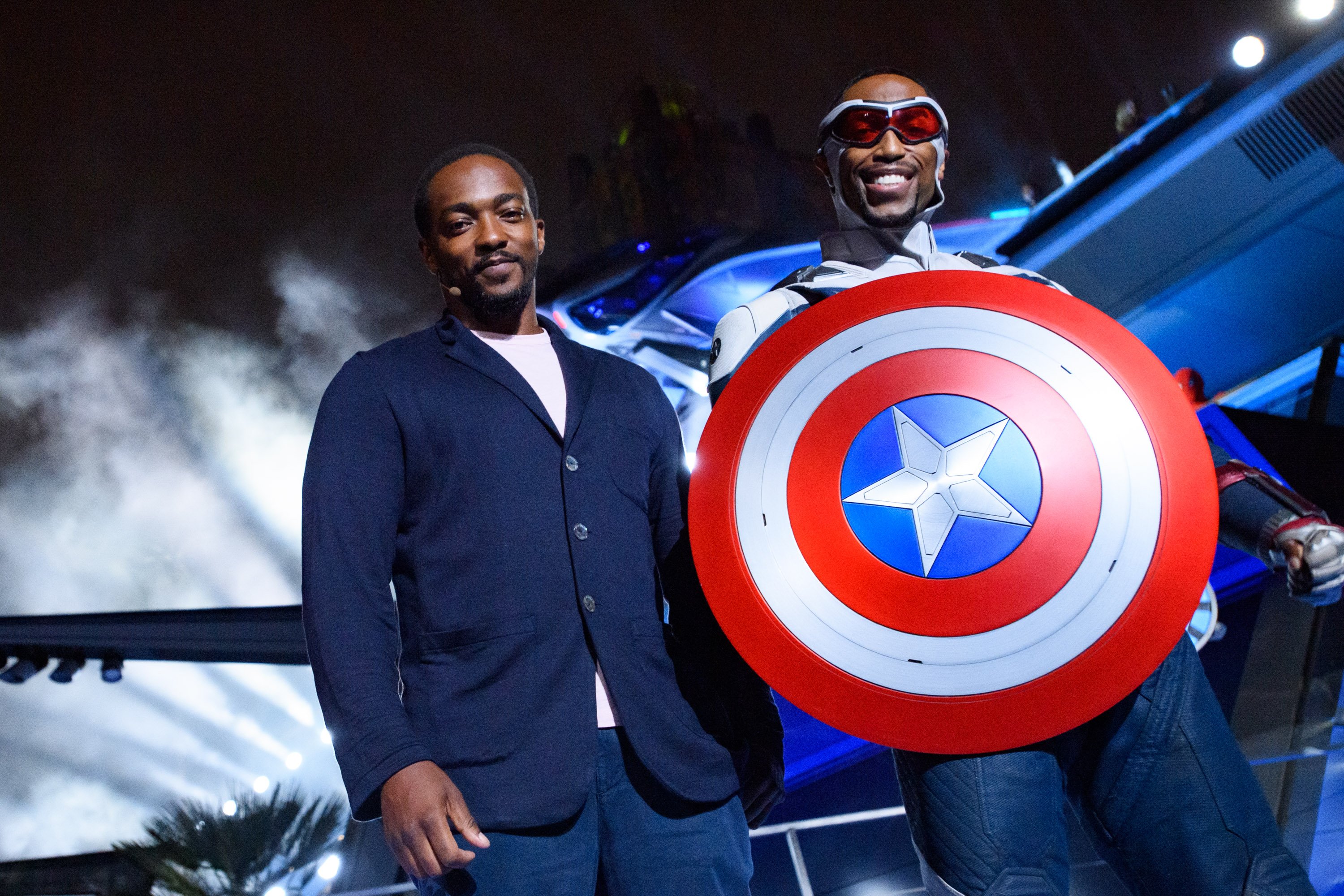 Anthony Mackie 'The Falcon and the Winter Soldier' standing next to actor dressed as Sam Wilson