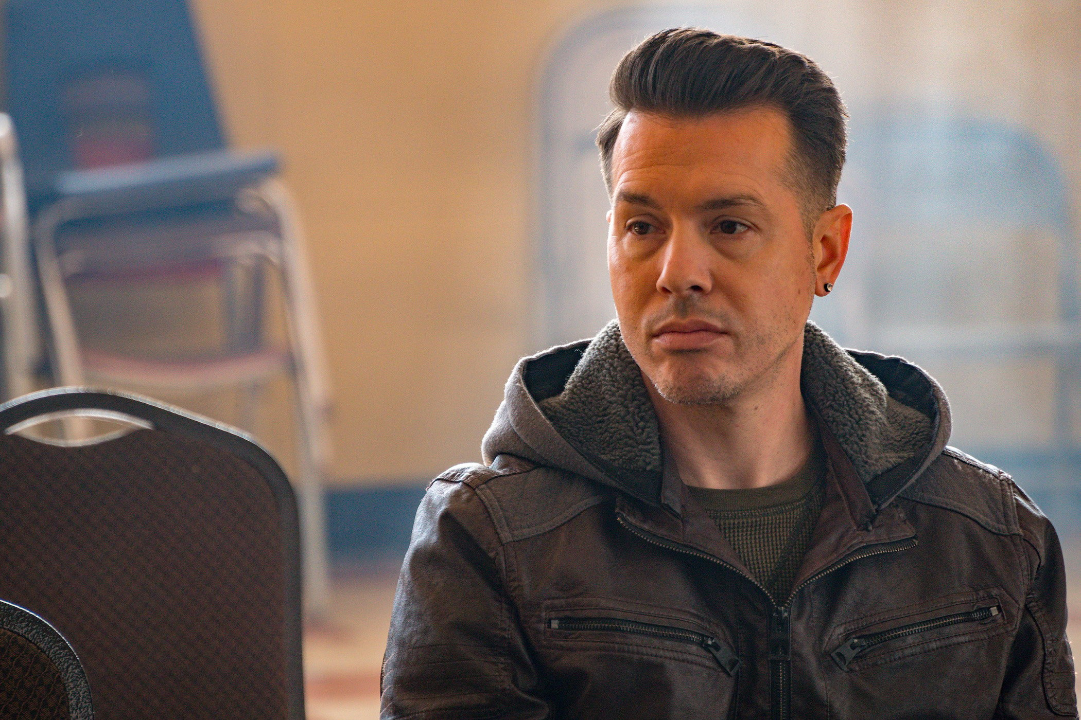 Jon Seda as Antonio Dawson in 'Chicago P.D.' sitting alone.