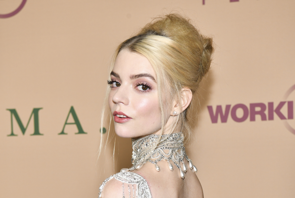 Anya Taylor-Joy in a silver dress with blonde hair in an up-do.