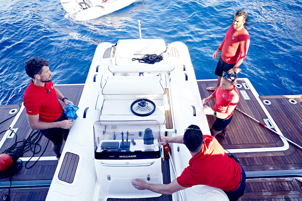 Malia White gives direction to the Below Deck Mediterranean Season 5 deck crew, Robert Westergaard, Alex Radcliffe, and Pete Hunziker