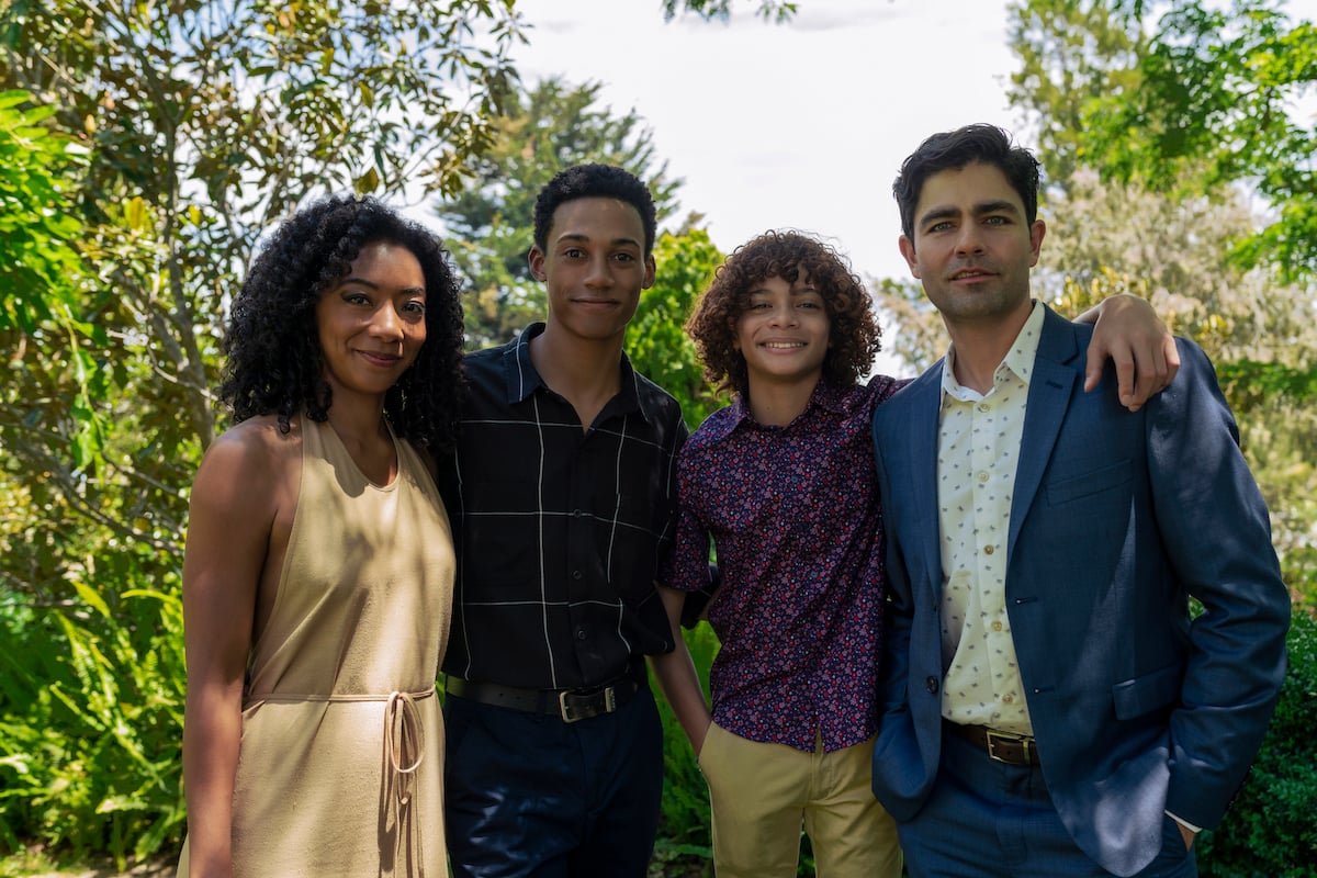 Betty Gabriel, Camaron Engels, Jaylin Fletcher, and Adrian Grenier stand next to each and smile in 'Clickbait'