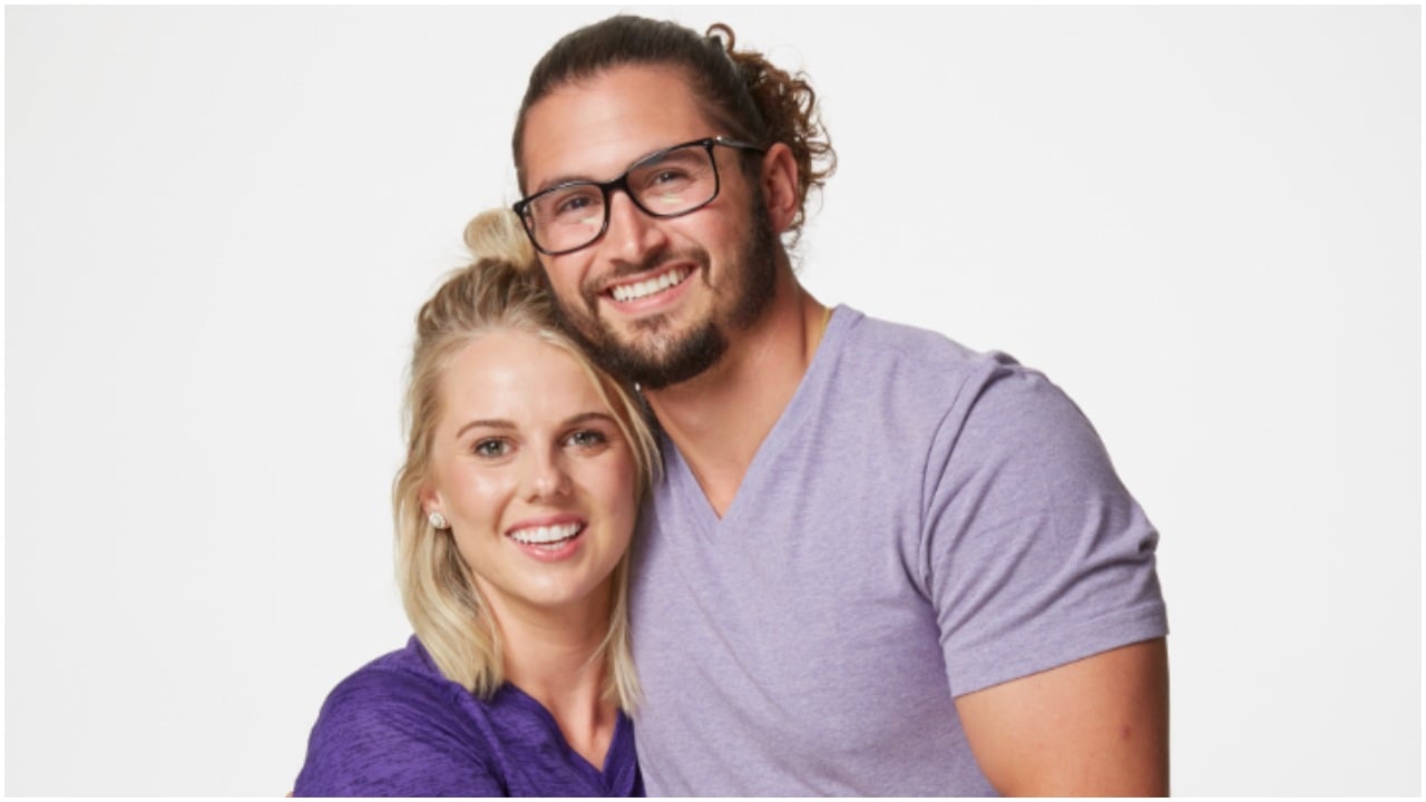 Nicole Franzel and Victor Arroyo pose for their 'The Amazing Race' cast photo