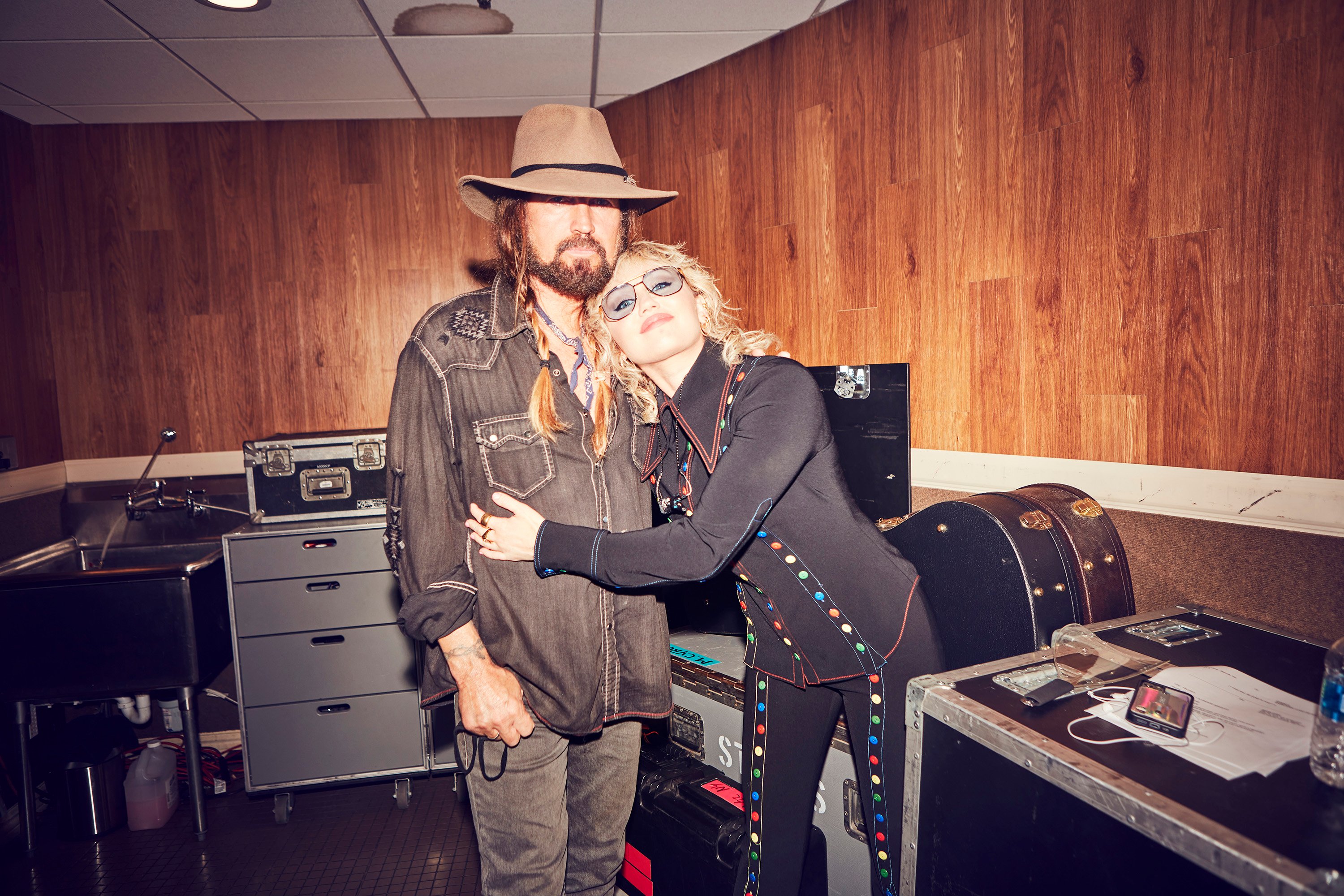 Billy Ray Cyrus and his daughter Miley Cyrus pose for a photo together