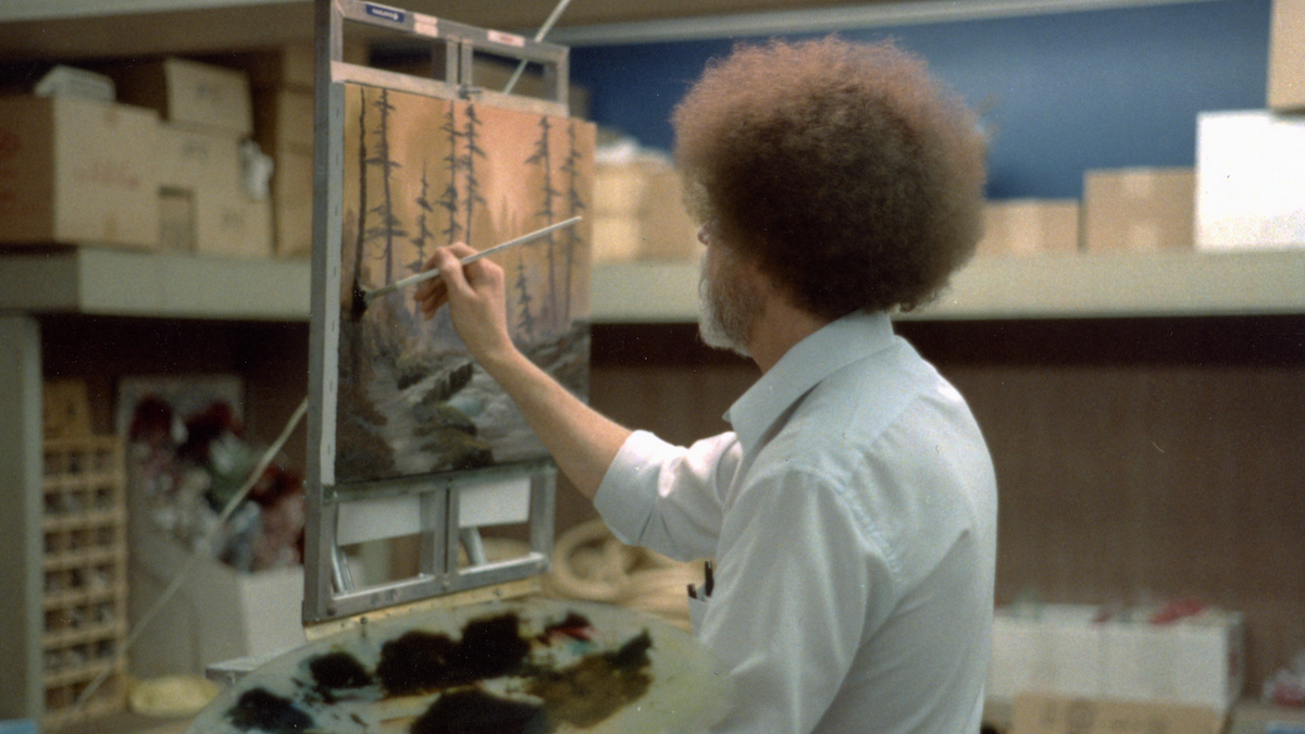 Bob Ross painting a picture in the film 'Bob Ross: Happy Accidents, Betrayal & Greed'