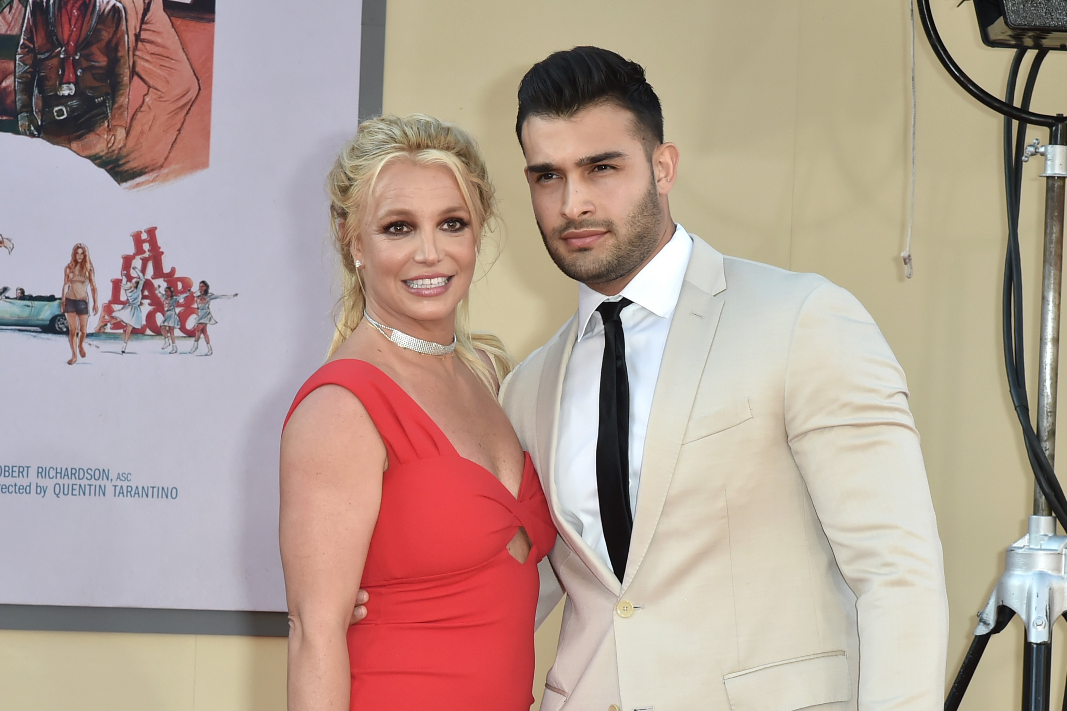 Britney Spears and boyfriend Sam Asghari posing for photographers in 2019