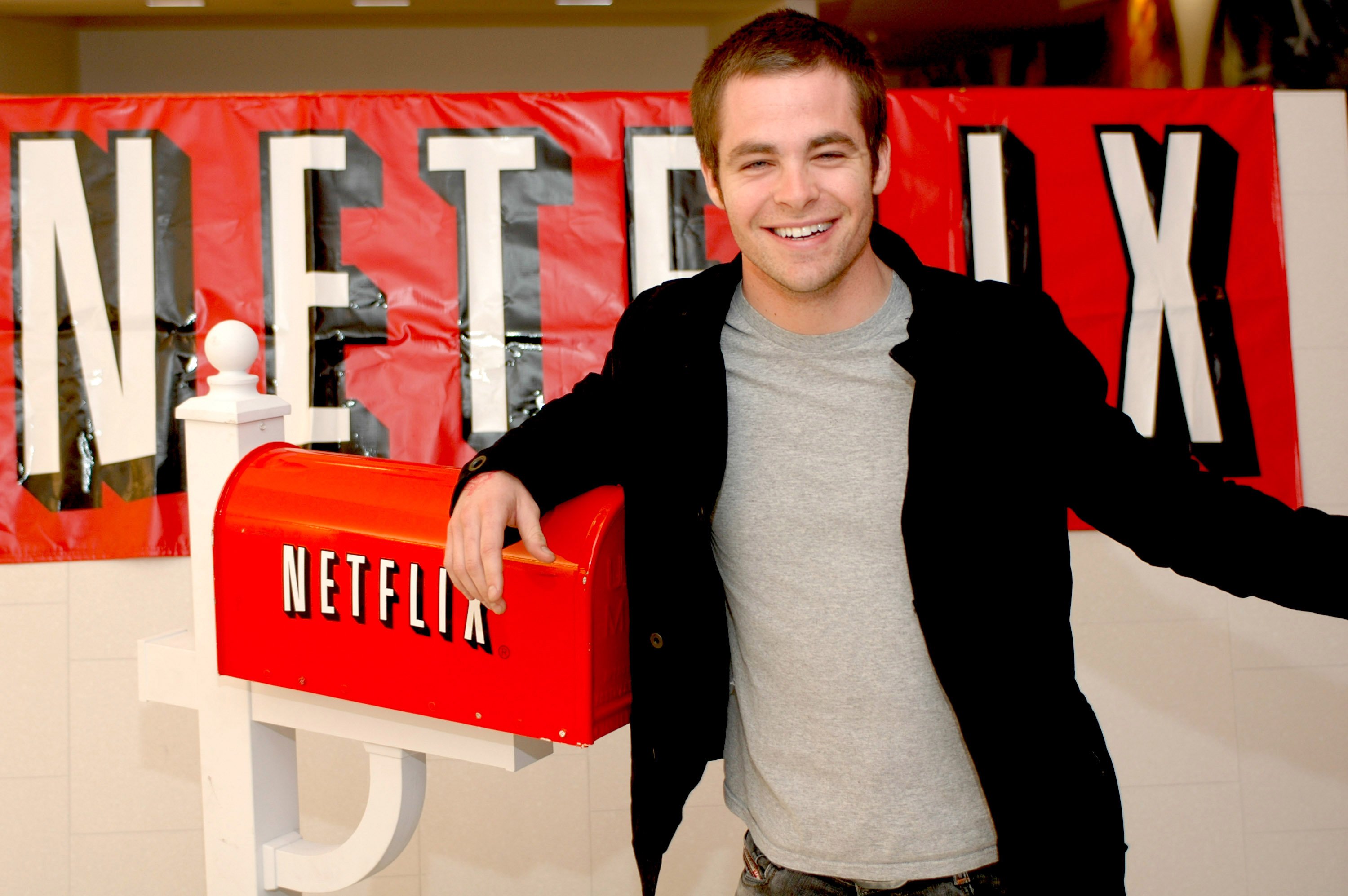 Chris Pine stands next to the Netflix logo at the premiere of 'Cowboy Del Amor' in 2015, more than a decade after he auditioned for 'Gilmore Girls'