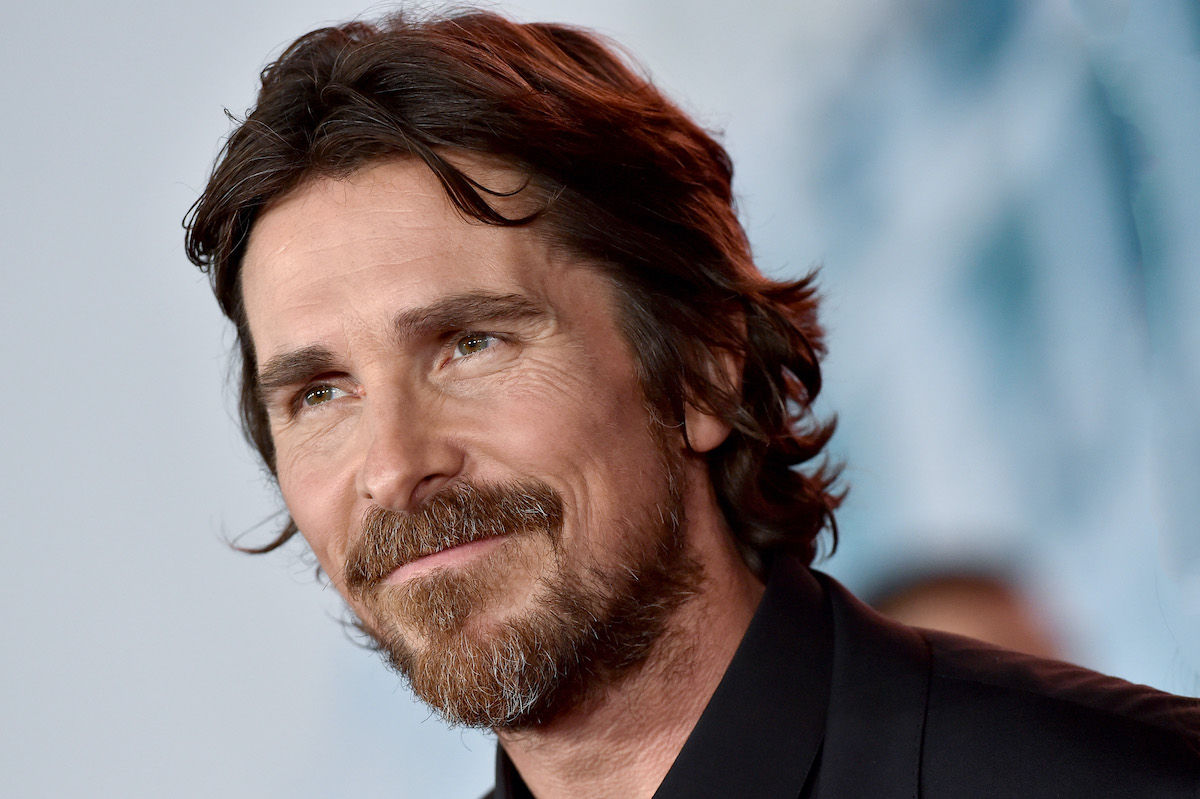Christian Bale smiles on the red carpet