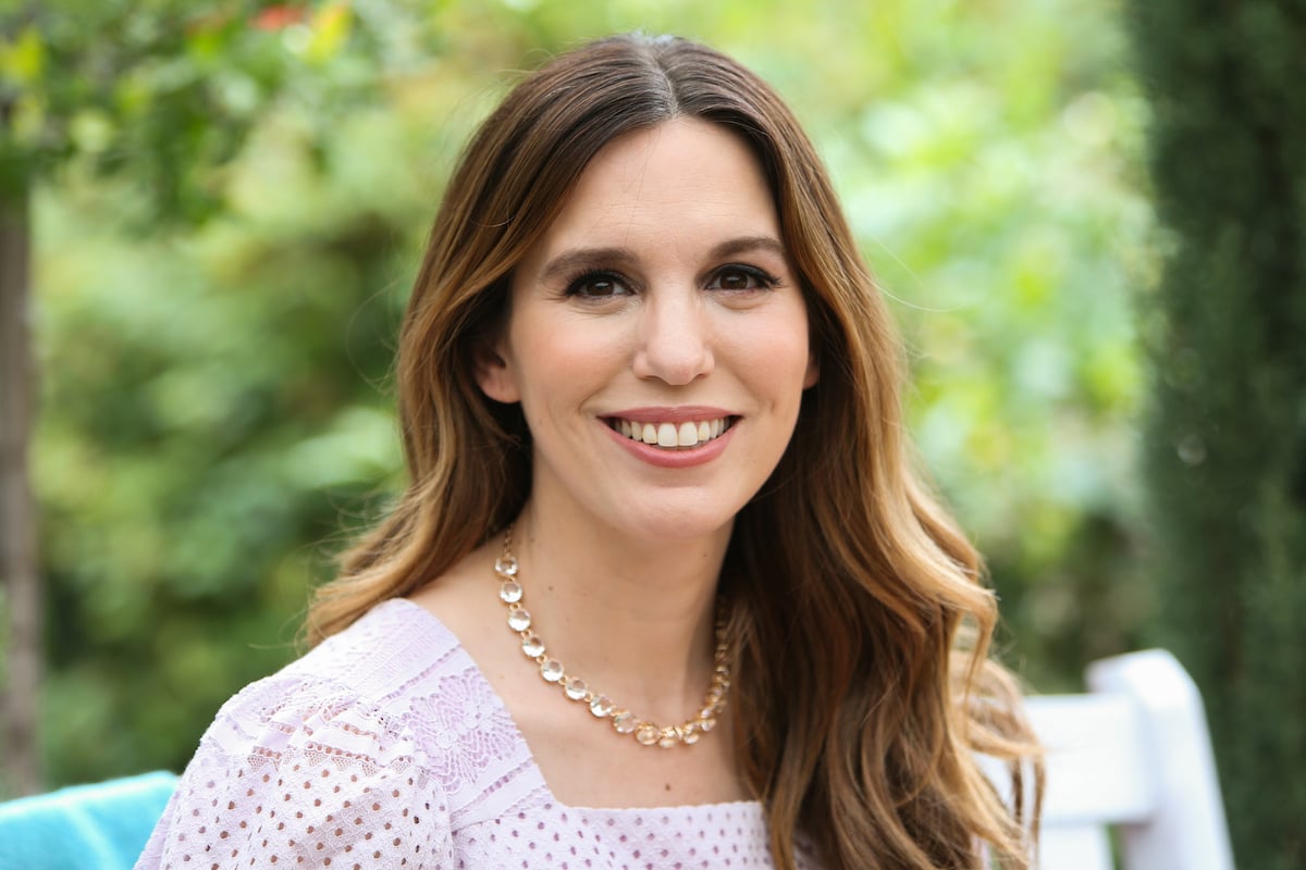 Christy Carlson Romano with long hair and pink dress