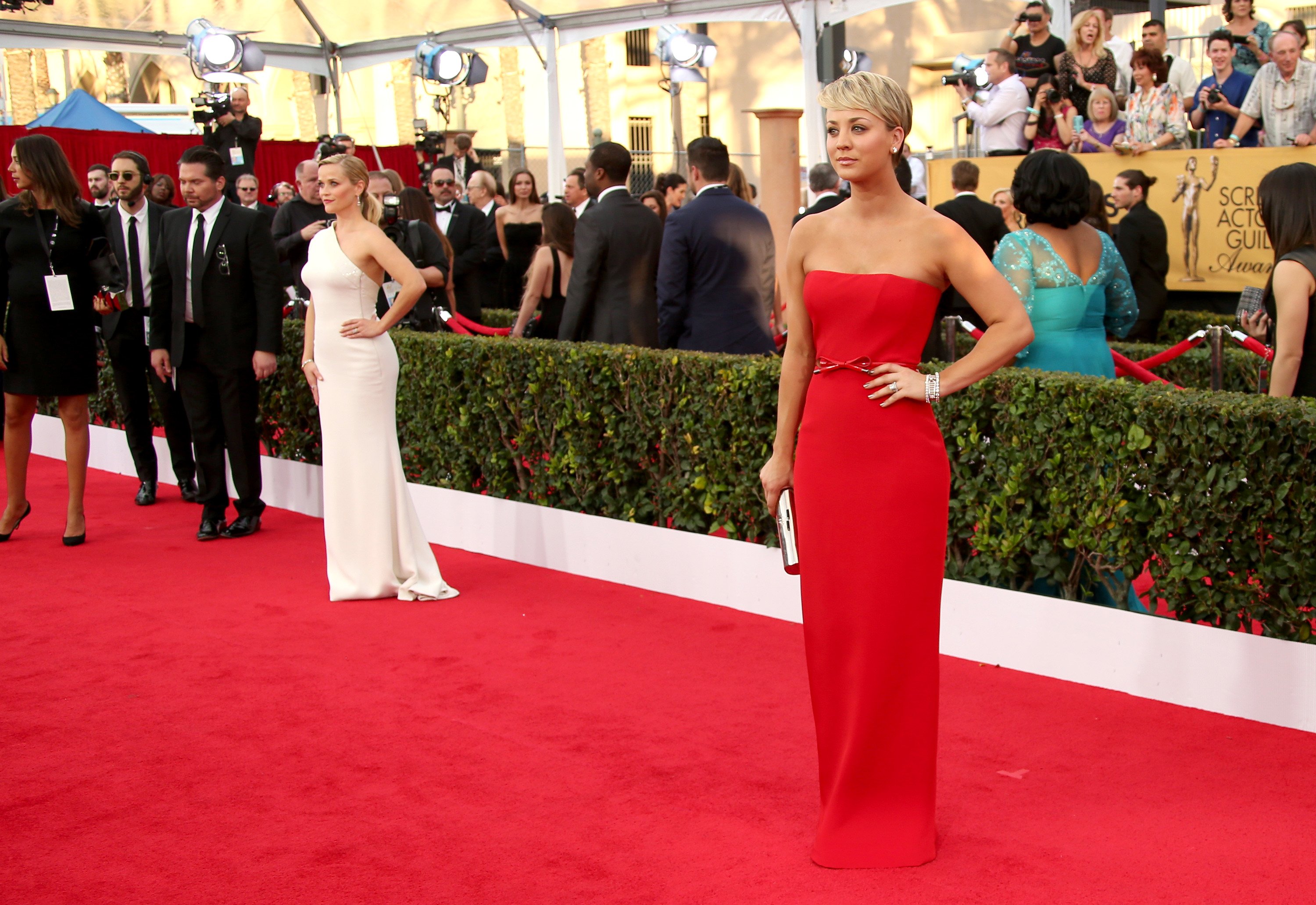 Reese Witherspoon and Kaley Cuoco are seen standing on the red carpet for the 21st Annual Screen Actors Guild Awards at The Shrine Auditorium in 2015