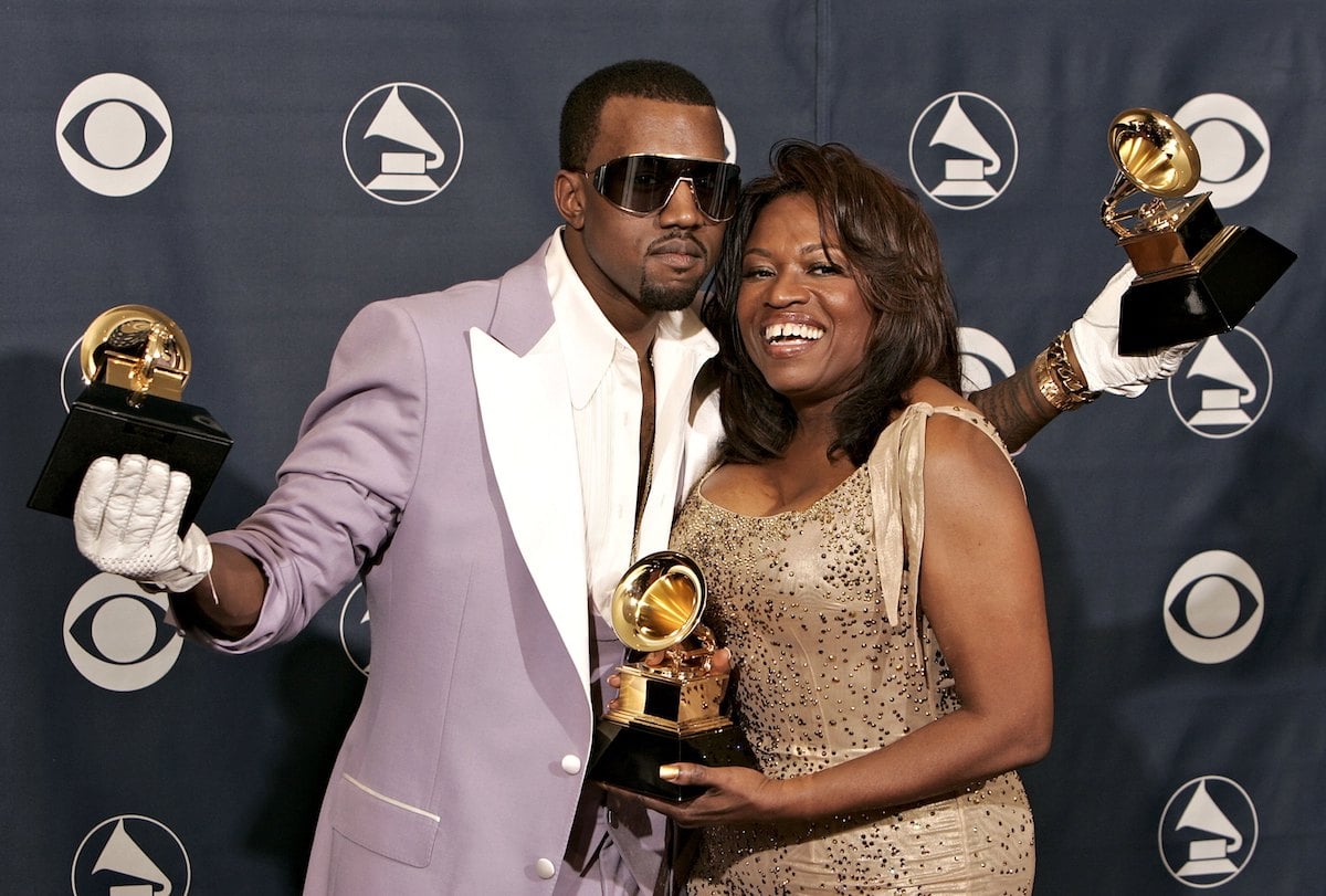 Singer Kanye West with his awards for Best Rap Song, Best Rap Solo Performance and Best Rap Album with his mother Donda West pose in the press room at the 48th Annual Grammy Awards at the Staples Center on February 8, 2006 in Los Angeles, California.
