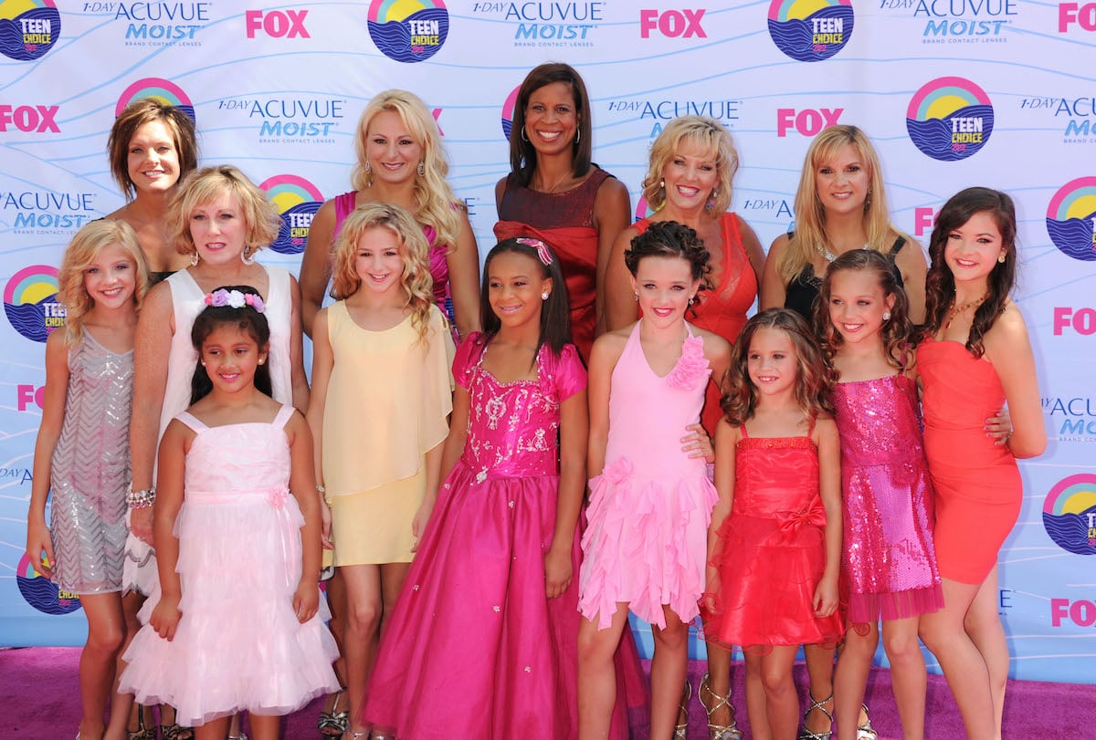 Dance Moms cast and Nia Sioux pose on the red carpet