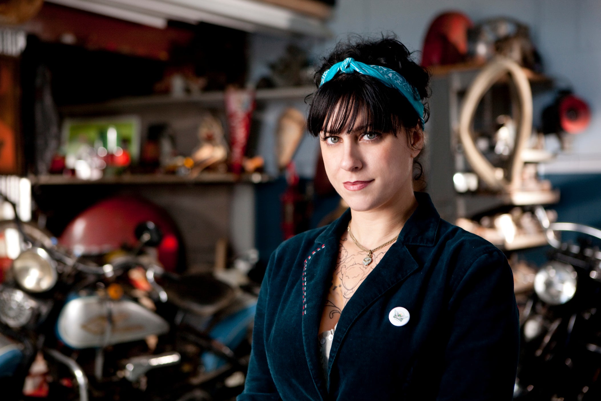 Danielle Colby with blue headband in her hair on 'American Pickers'