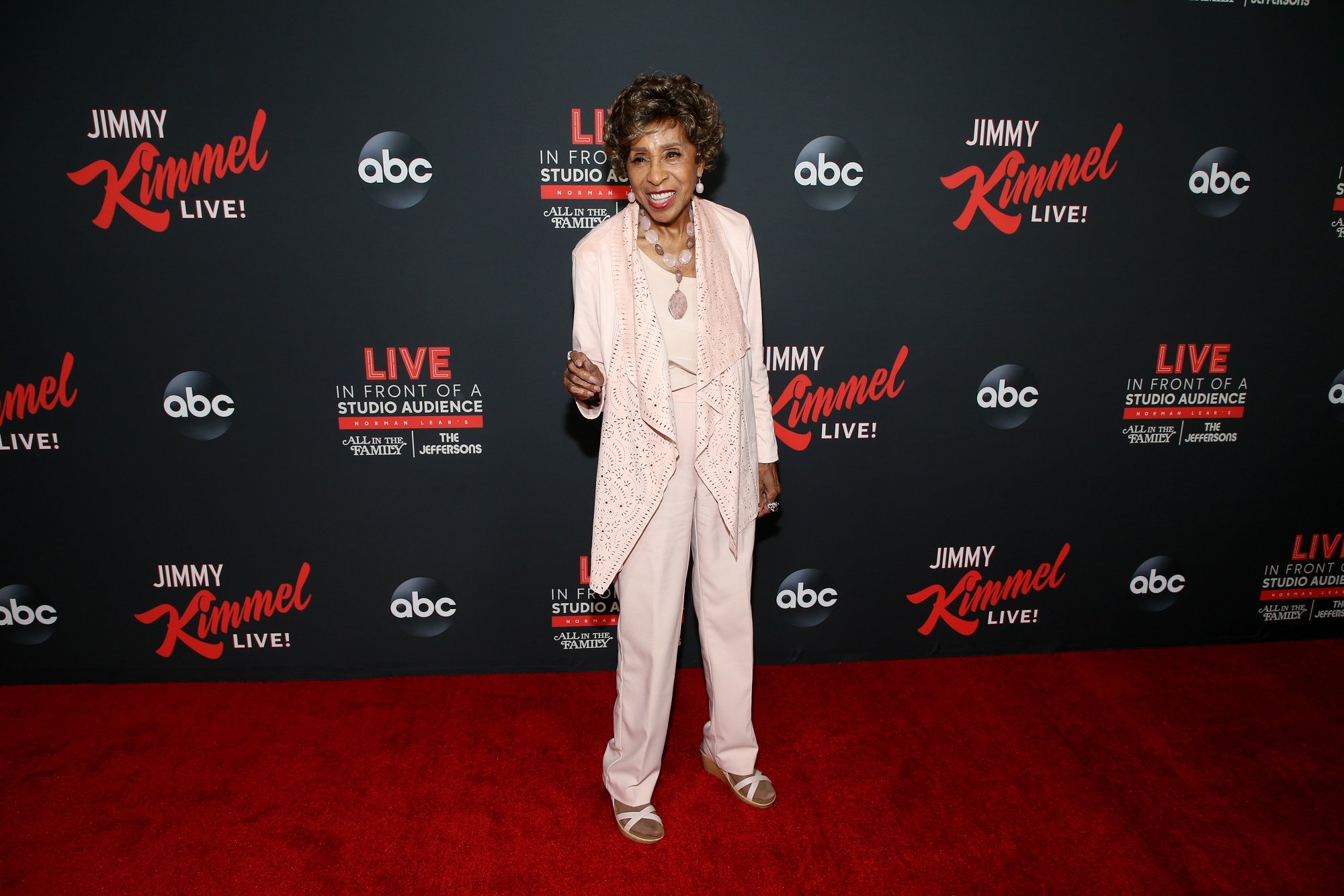 Days of Our Lives stars Marla Gibbs, pictured here in a pink suit on the red carpet