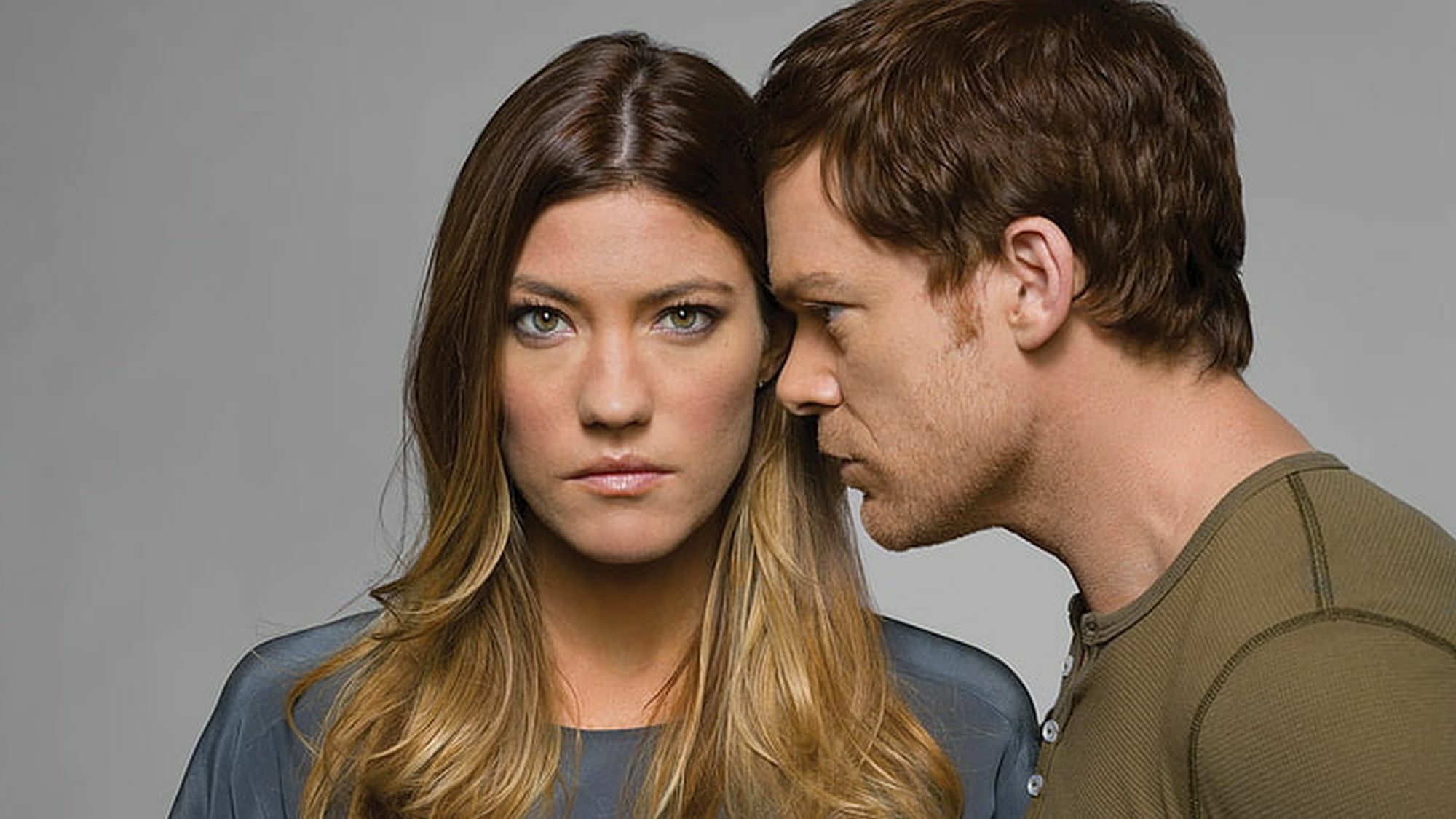Jennifer Carpenter as Deb 'Dexter: New Blood' facing forward and Dexter staring at Deb