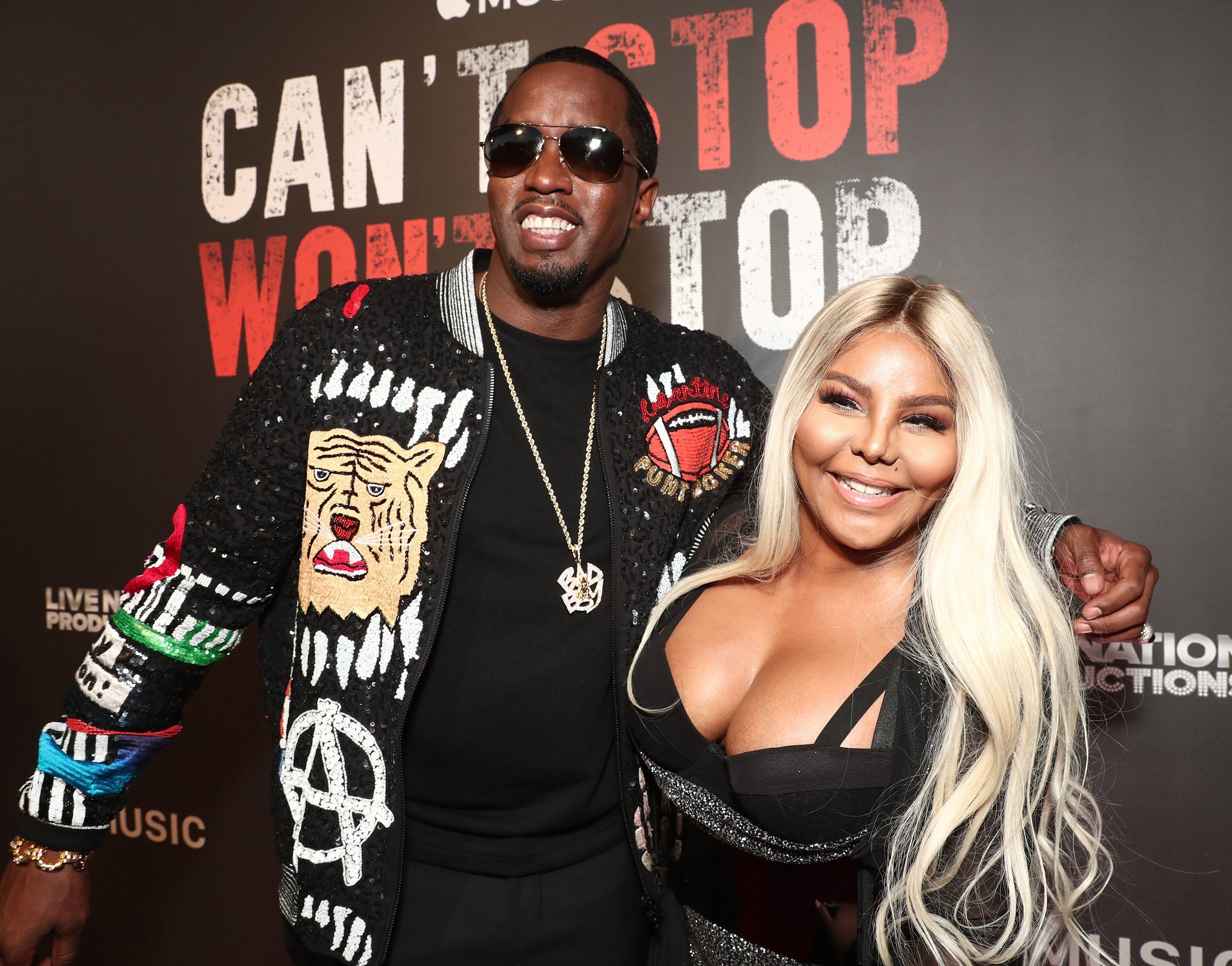 Sean 'Diddy' Combs and Lil' Kim attend the Los Angeles Premiere of "Can't Stop Won't Stop" at the Writers Guild of America
