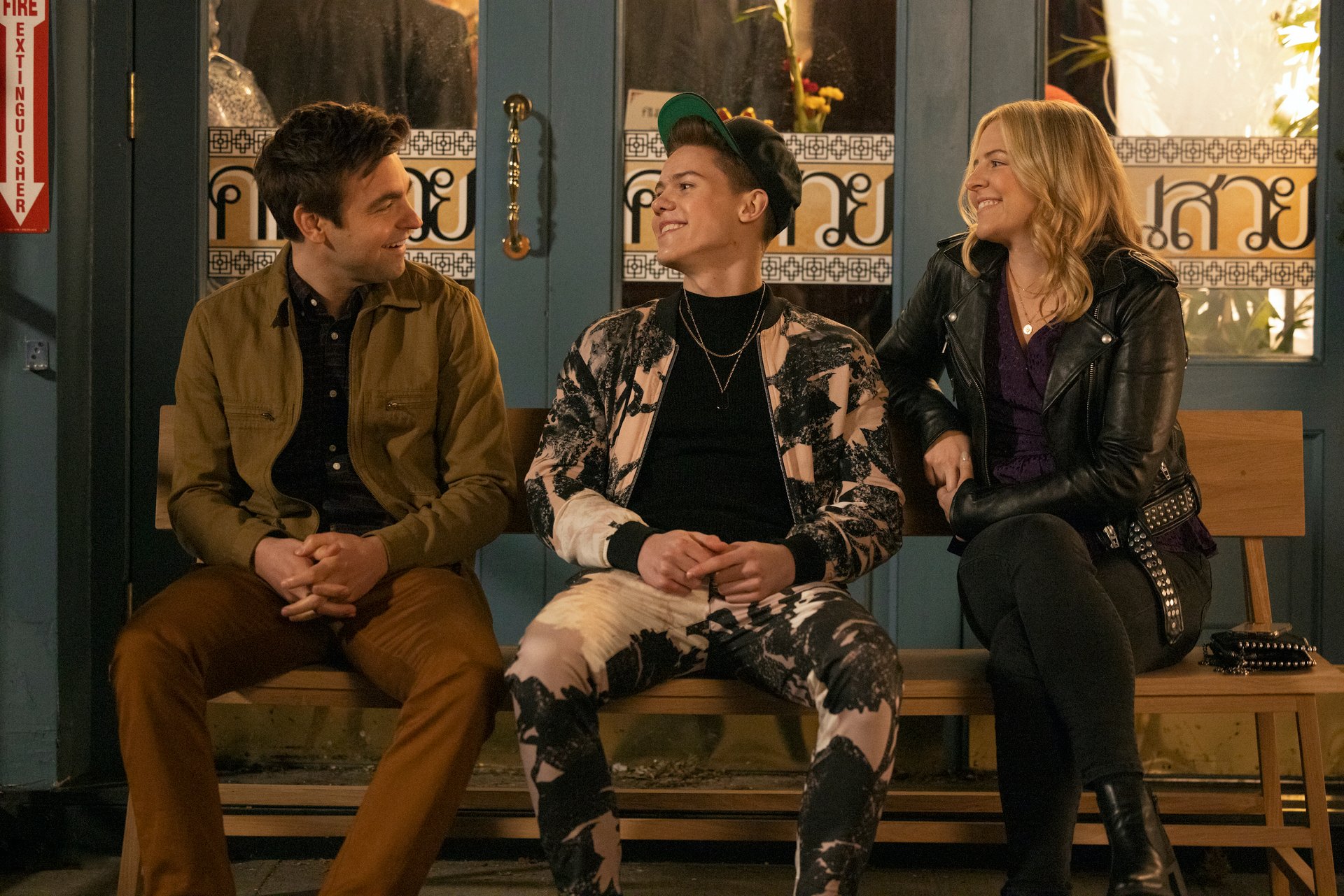 Drew Tarver, Case Walker, and Heléne Yorke sitting on a bench in 'The Other Two.'