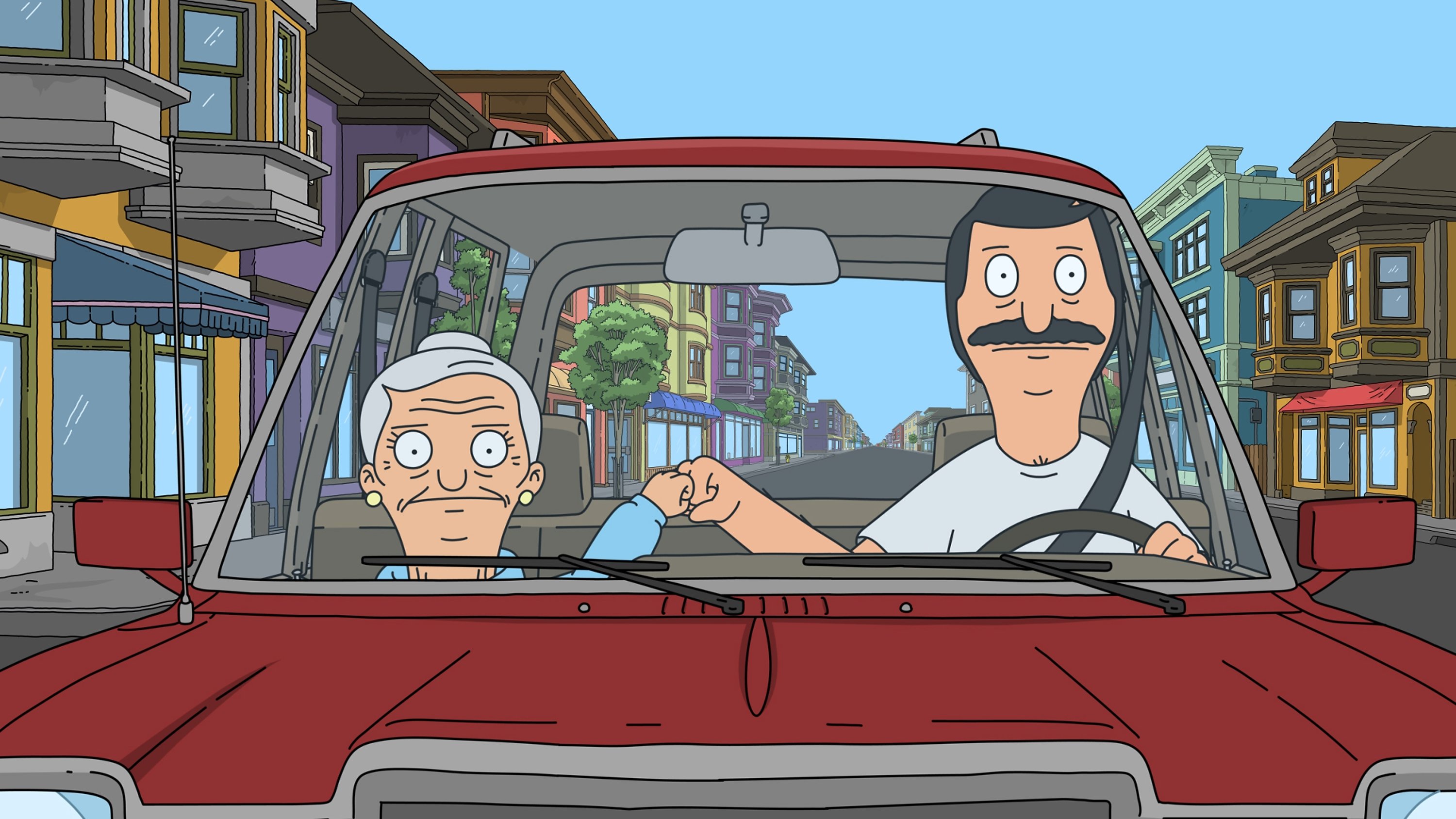 Edith and Bob 'Bob's Burgers' in car doing fist bump