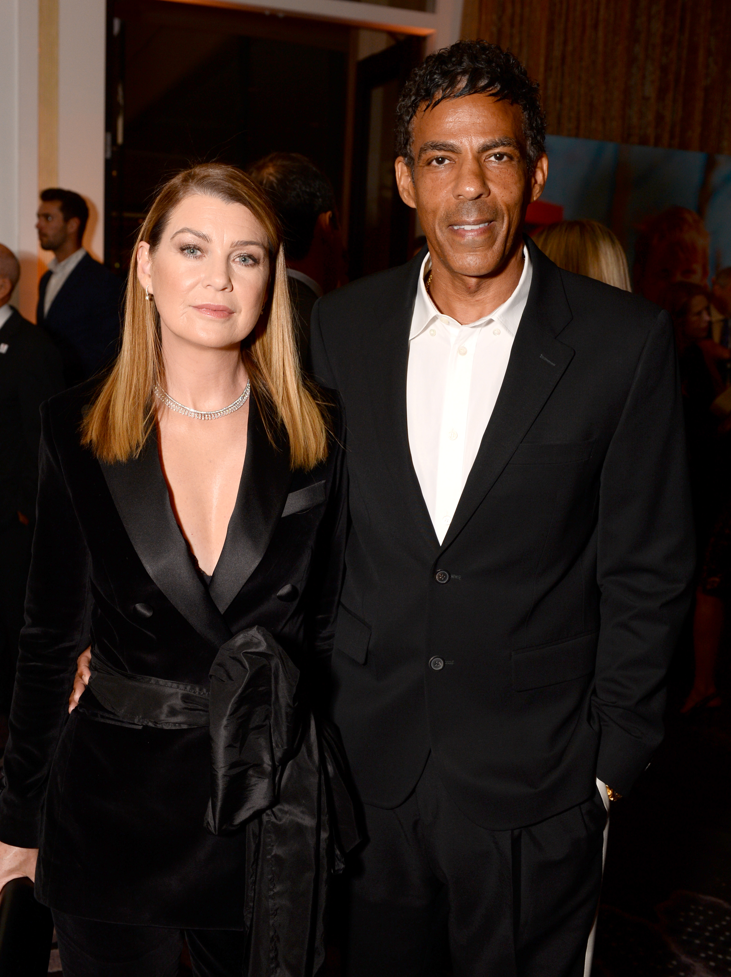 'Grey's Anatomy' star Ellen Pompeo and husband Chris Ivery wearing all-black outfits at an event.