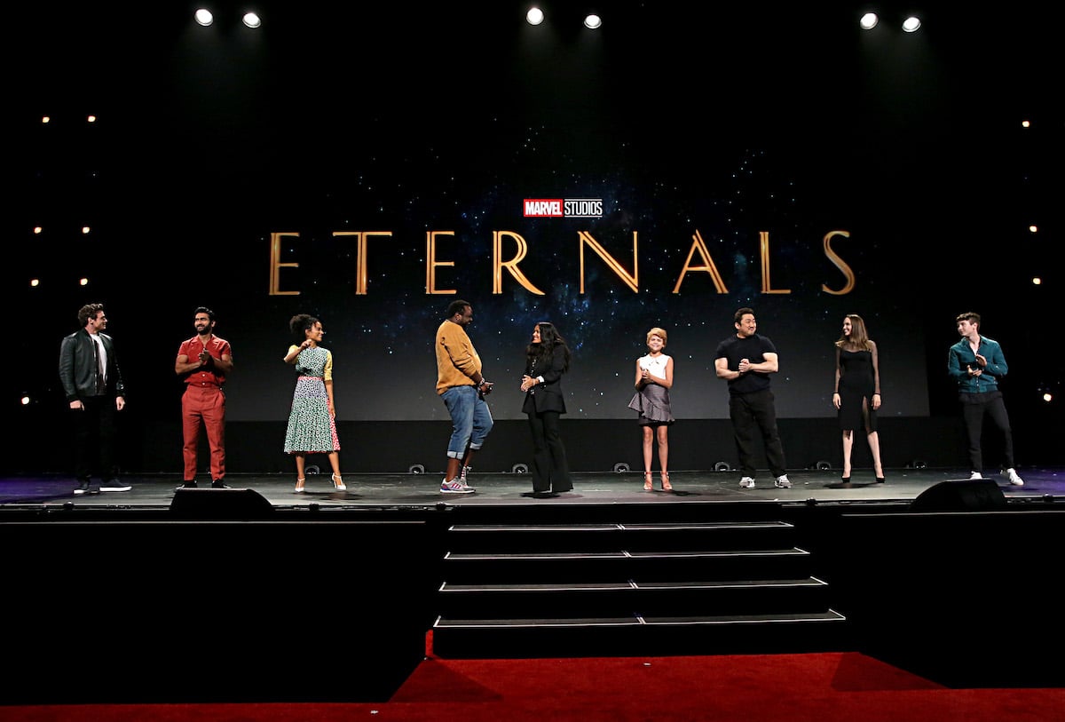 ‘The Eternals' cast standing side by side on stage at Disney’s D23 EXPO in 2019