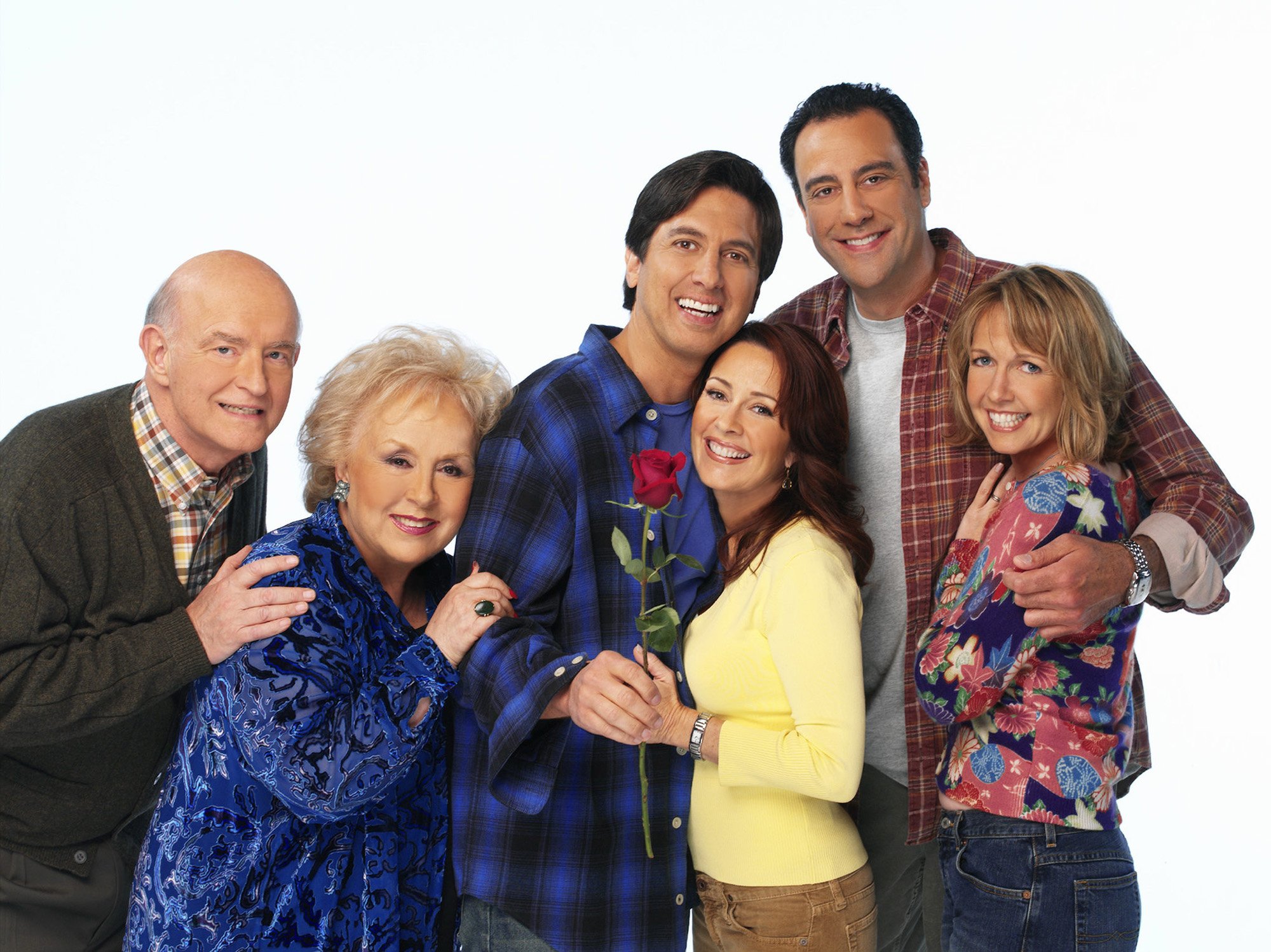 Peter Boyle, Doris Roberts, Ray Romano, Patricia Heaton, Brad Garrett, and Monica Horan pose for promotional photos ahead of the release of Everybody Loves Raymond episodes