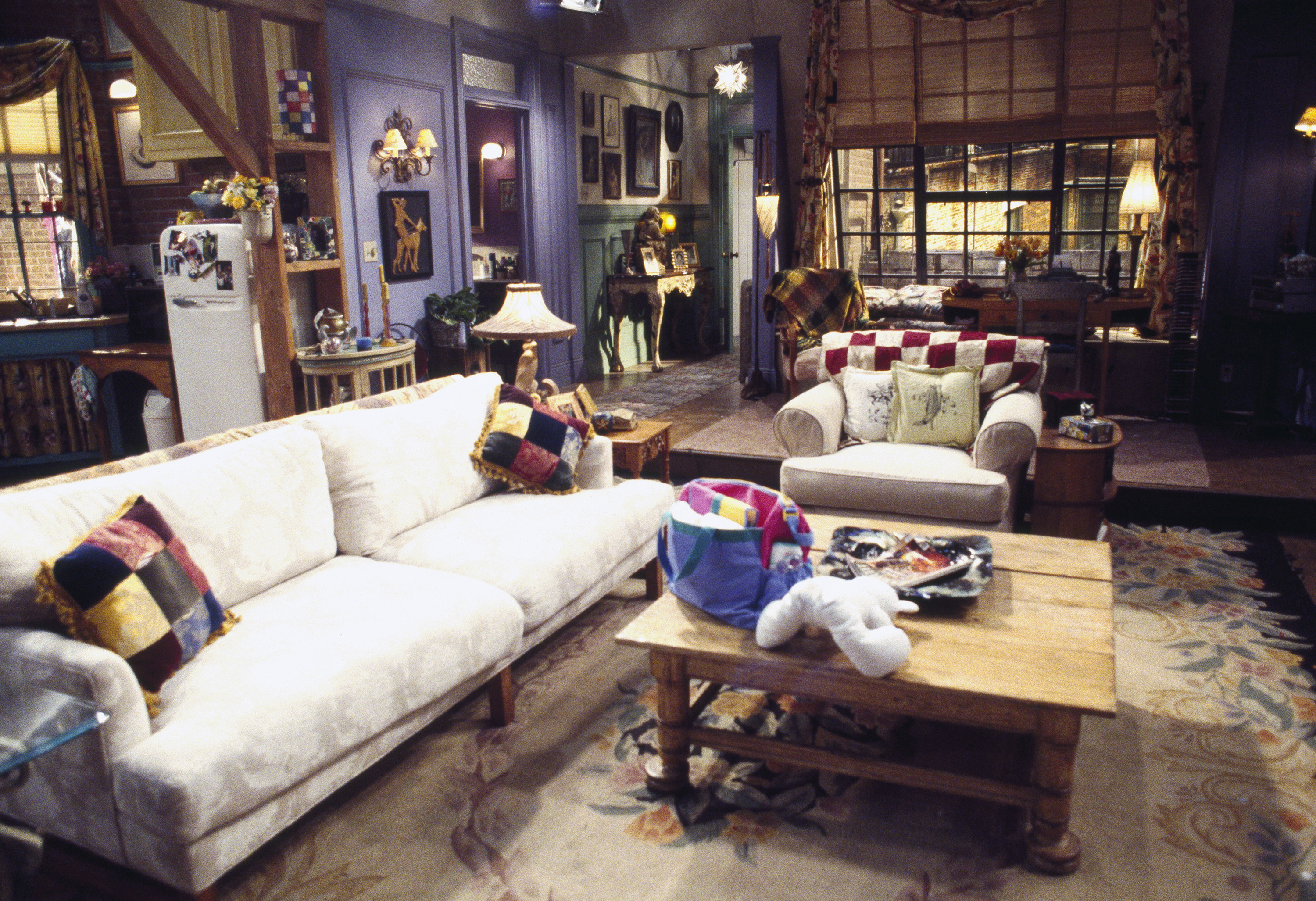 Monica Geller and Rachel Green's living room is shown with noone sitting in it during a season 2 shoot of 'Friends'